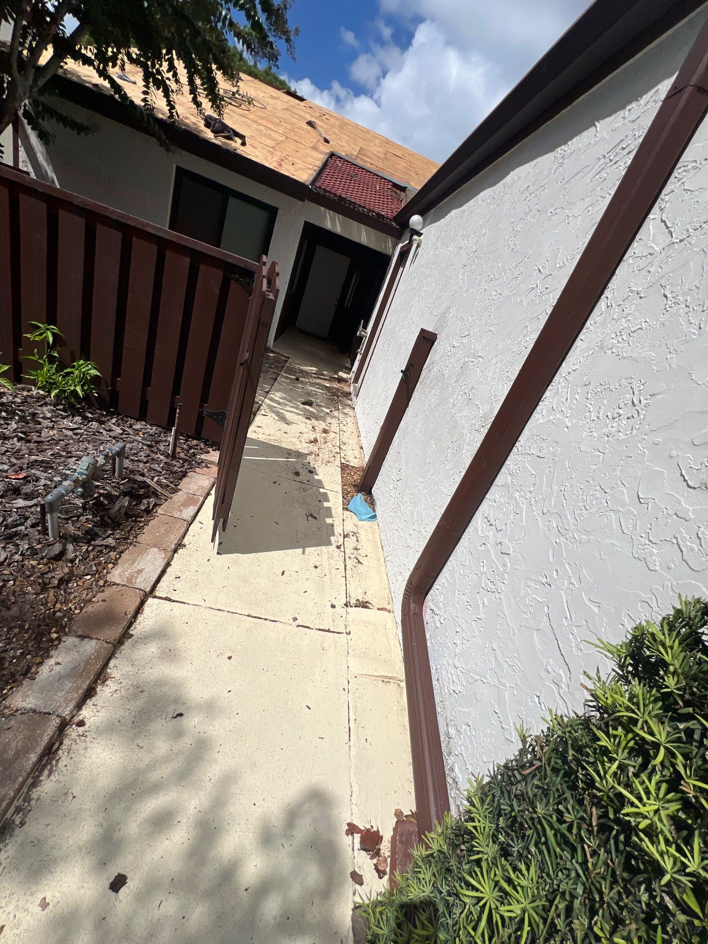 Residential Tile Roof Replacement and Gutter Installation in Winter Park by Pinnacle Roofing Group