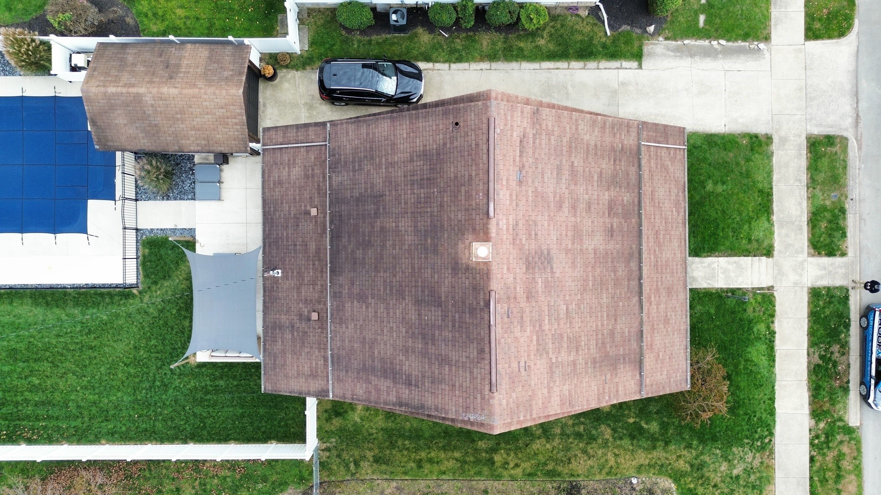 Residential Roofing Installation using Perfromance Panel Metal - Black by RoofX 