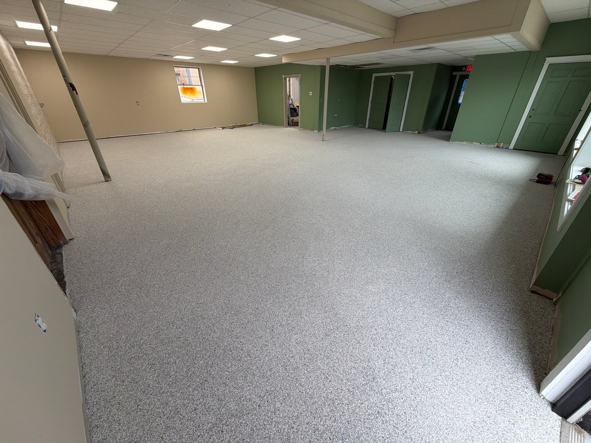 Commercial Epoxy Flake Floor Installation and Concrete Refinishing in Montague by Gordon Painting