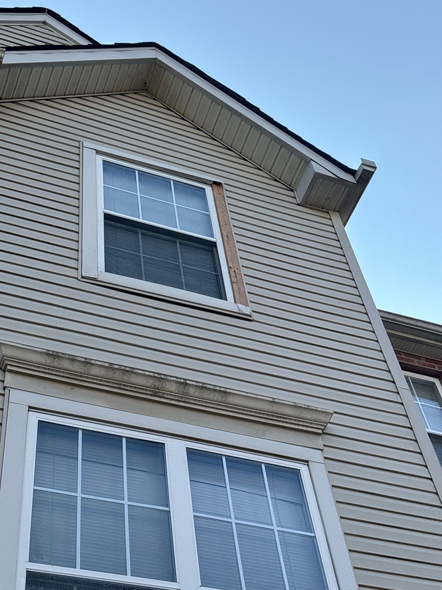 Third-Floor Window Capping Reinstallation After Storm Damage by Laser Focused Solutions LLC