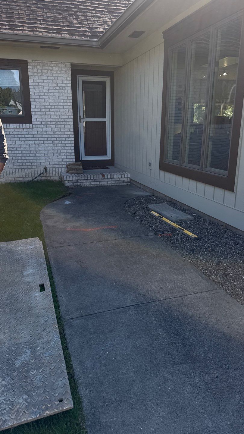 Broom finished concrete patio and walkways  by NG Masonry & Construction LLC