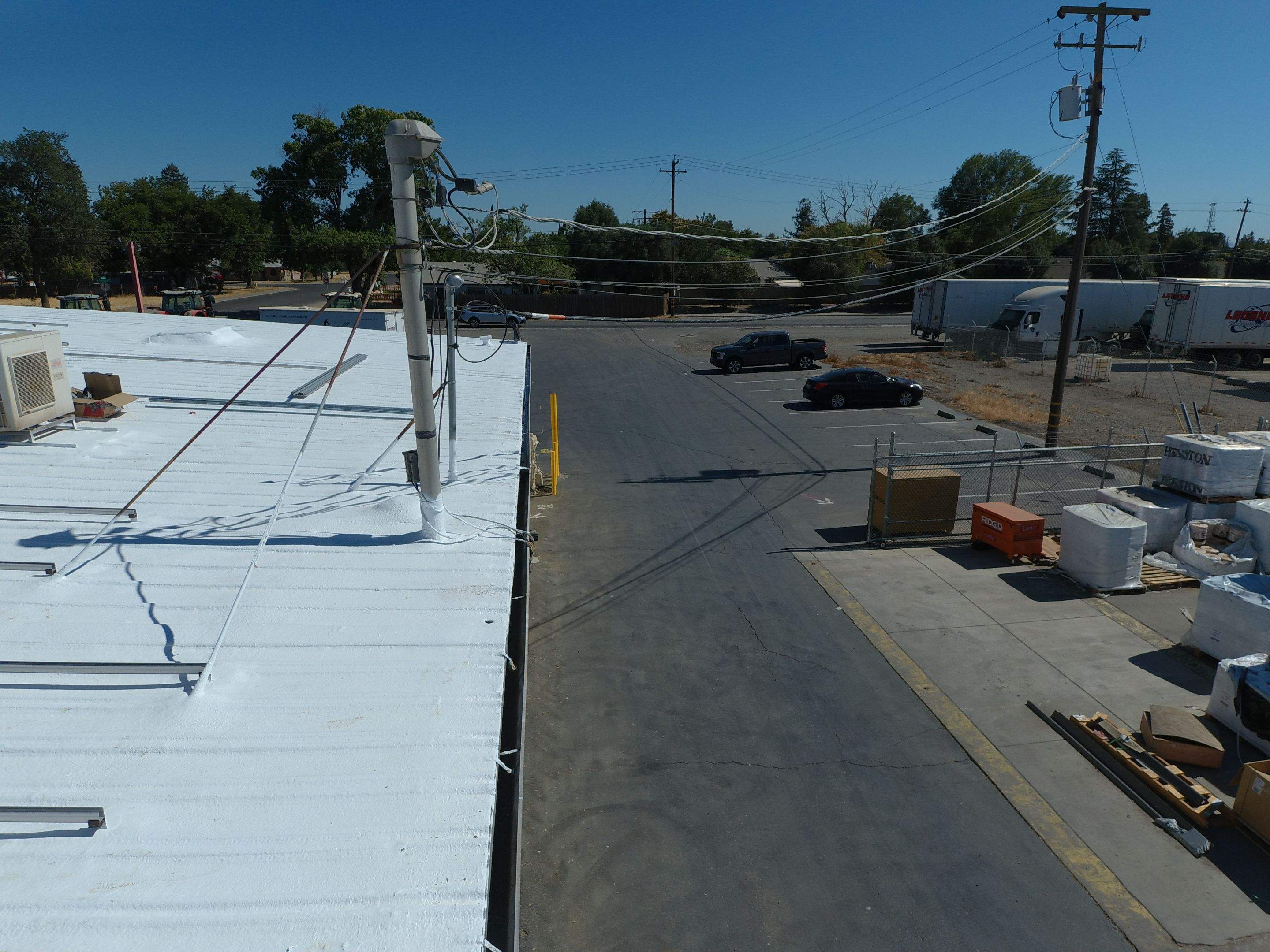 Spray foam and coatings using Conklin Benchmark/PUMA XL coatings and spray foam by Straight Edge Roofing Inc