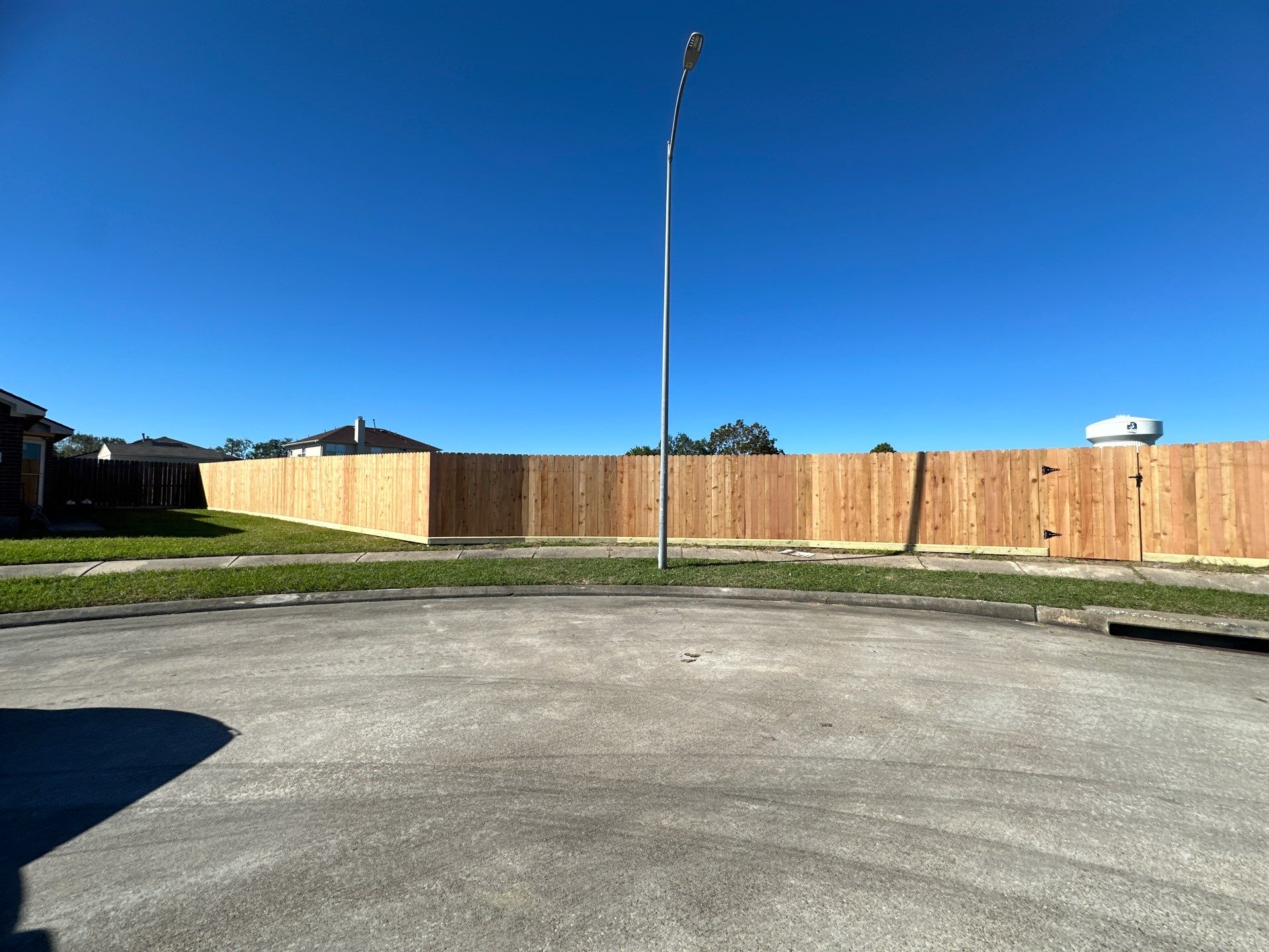 Premium Commercial Fence Installation with Western Red Cedar Pickets, 3 Rails, and Deluxe Wood Gates" by Tim's Fences