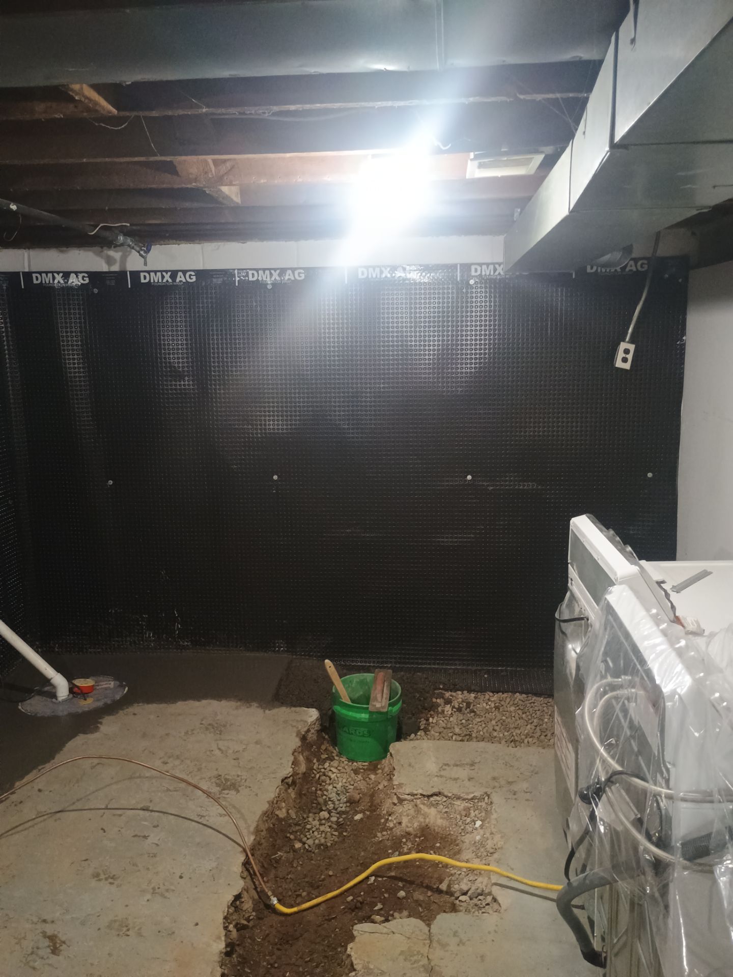 Interior Drain Tile & Yard French Drain in St. Paul, MN by Waterproofing Northeast