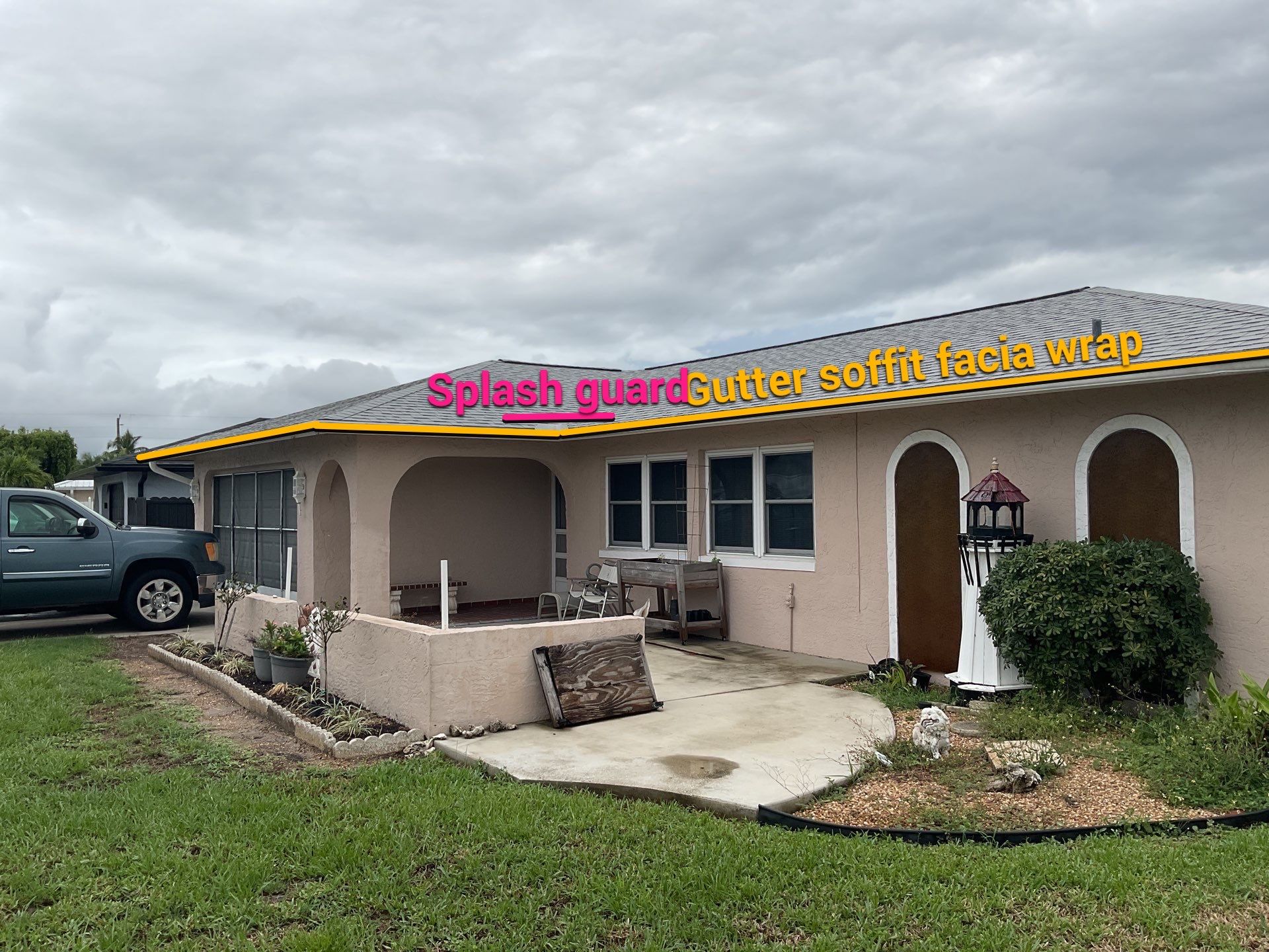 White Seamless Gutters and Splash Guards in Fort Myers FL by Gutter Professor by Gutter Professors