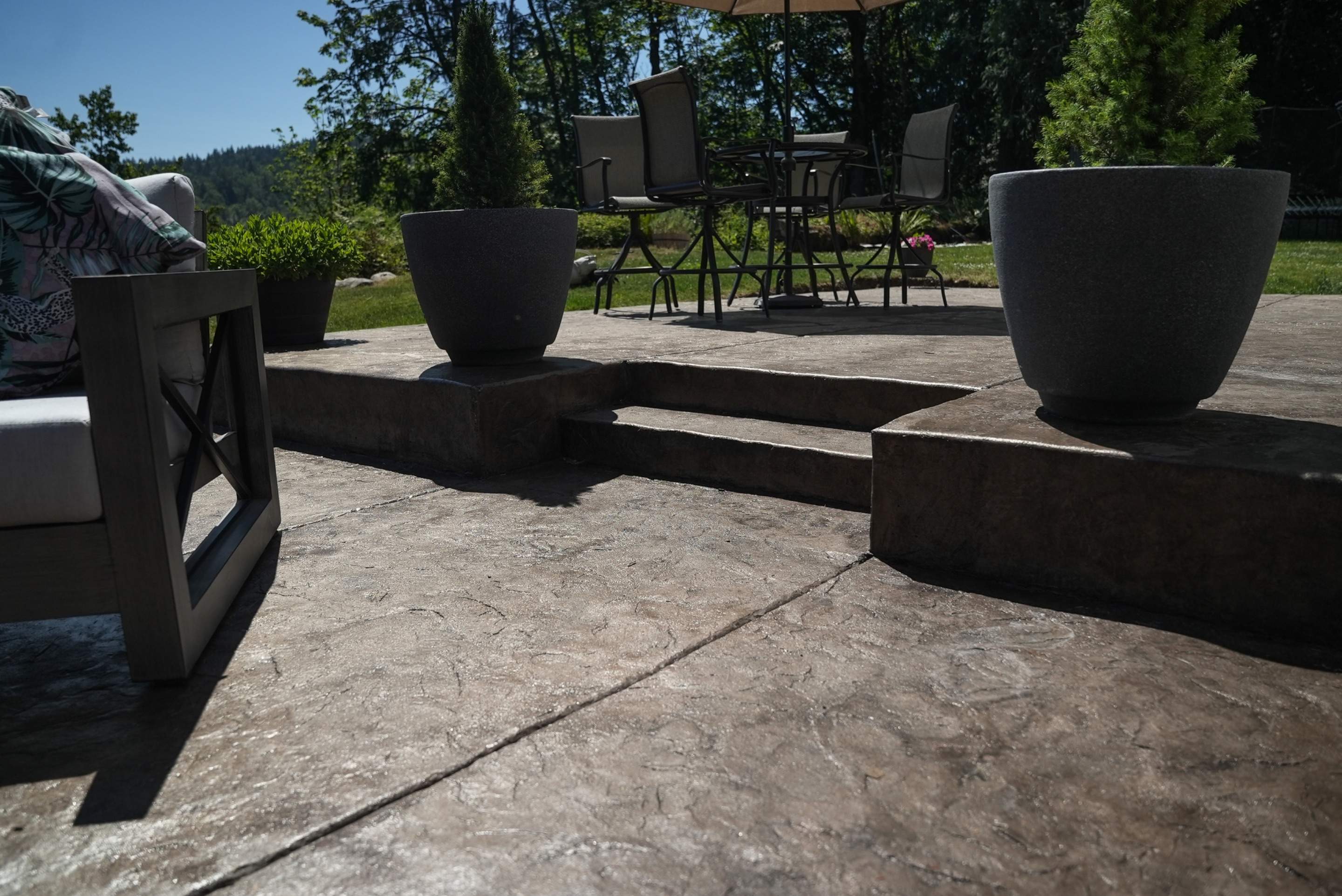 Mandy | Stamped Concrete Patio & Driveway by Jireh Asphalt & Concrete Inc 