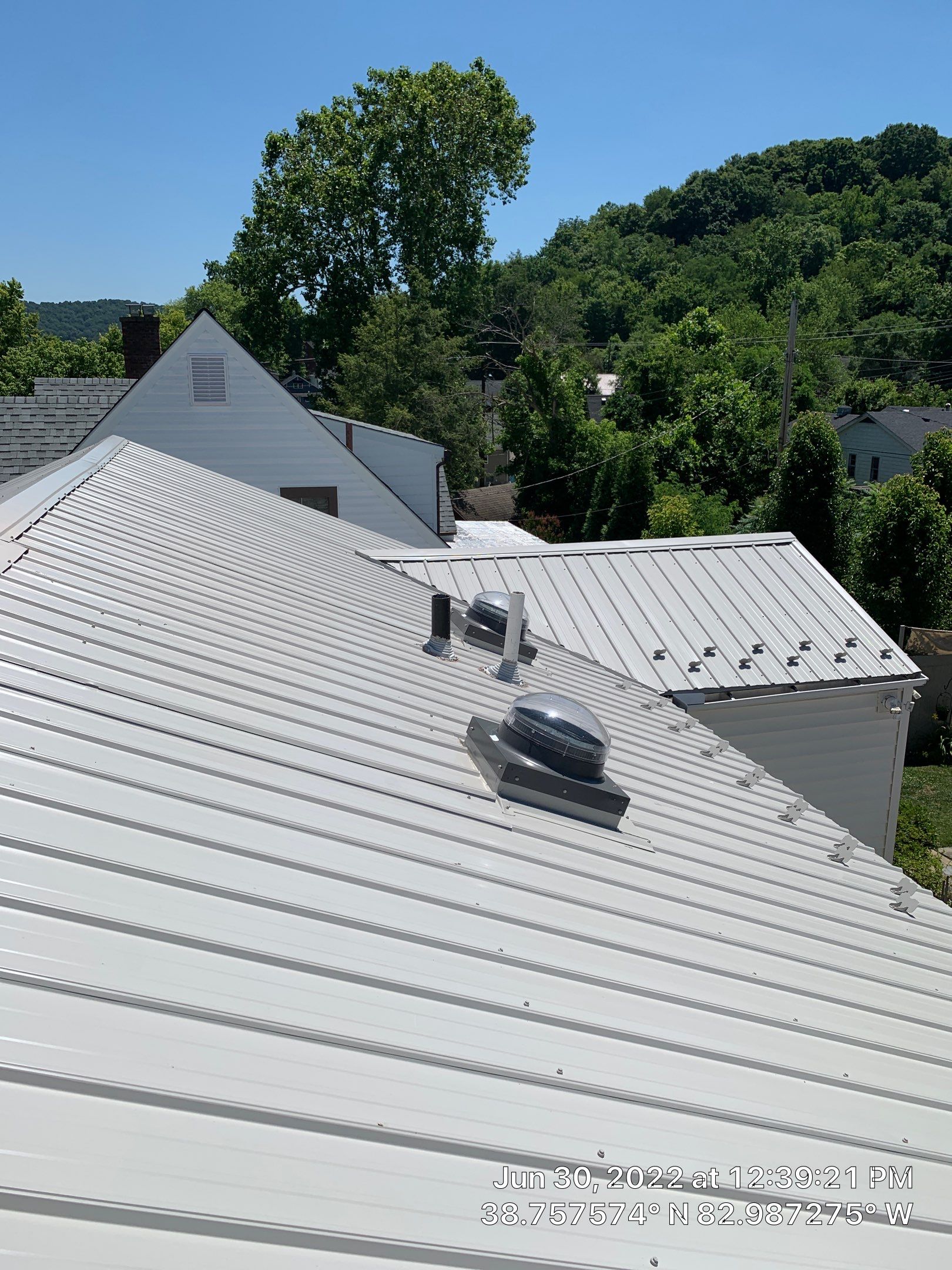 Metal Roofing, Skylights, Porch Build by Secure Construction Company Inc