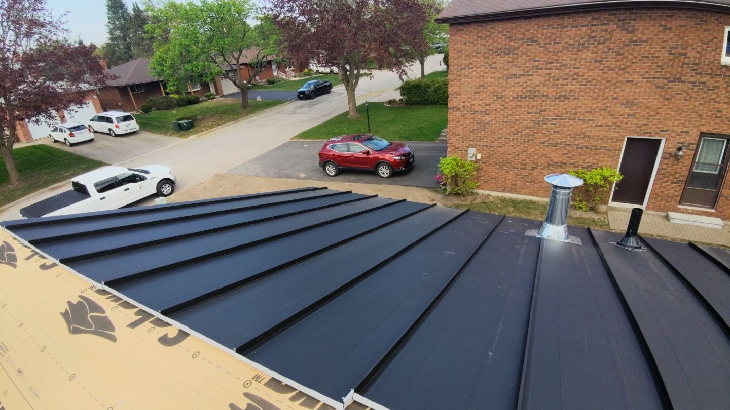 Residential Roofing Installation using 16" Standing Seam Panels by Jay Carter Roofing & Sheet Metal