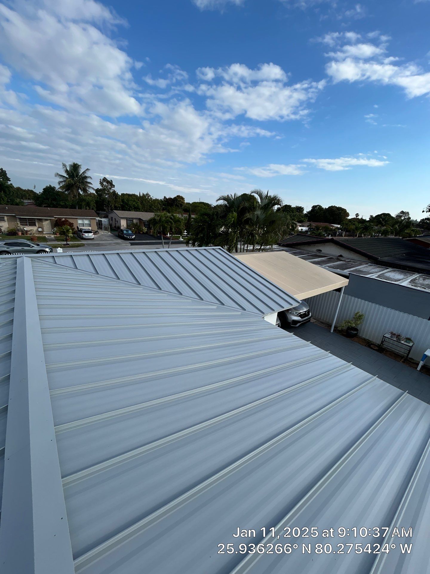 RESIDENTAL METAL REROOF 24 GUAGE DOVE GRAY 1-1/2" MECHANICAL SEAM METAL POLYGLASS POLYSTICK XFR by Earl W. Johnston Roofing 