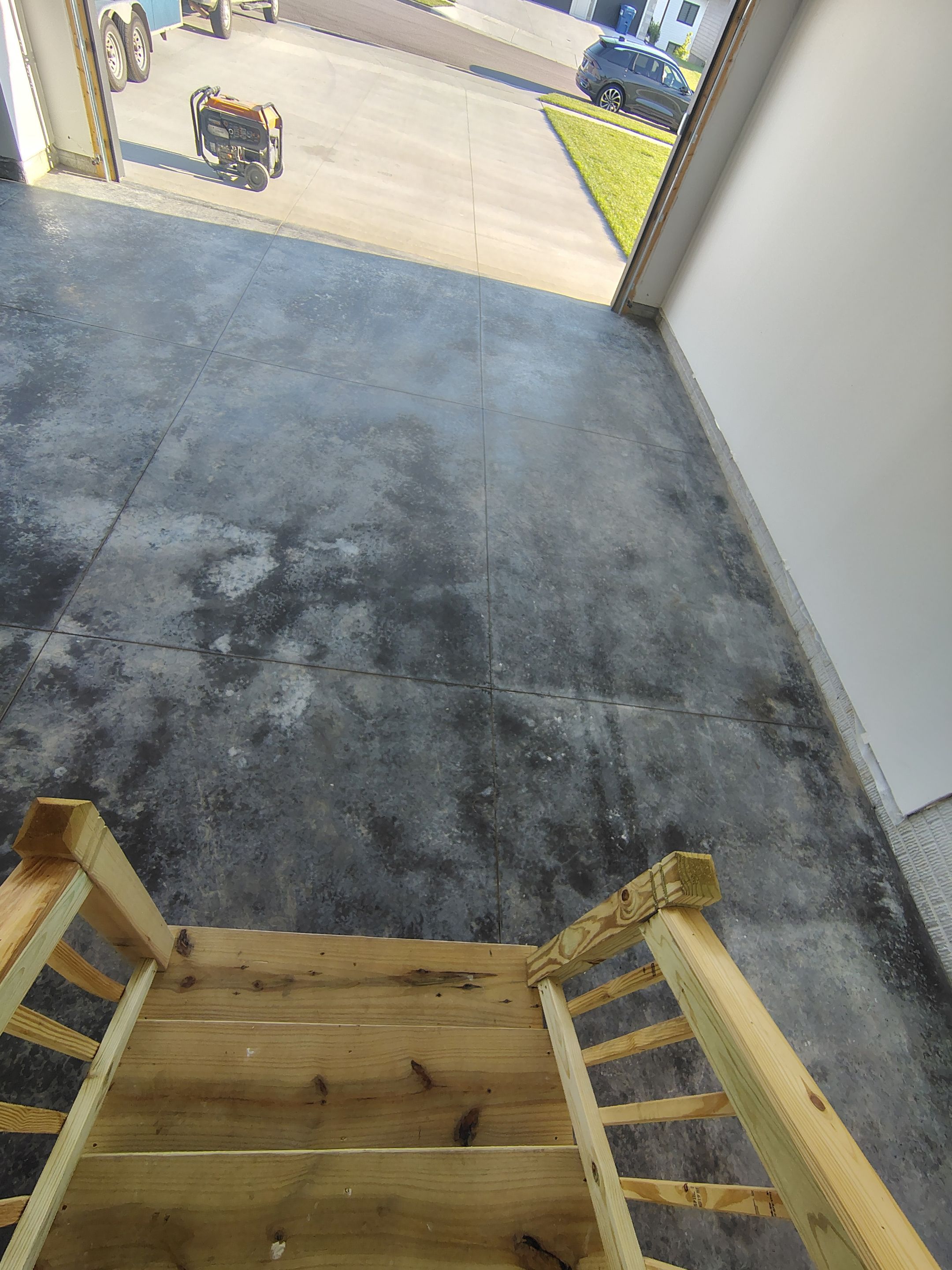 Cabin Fever Decorative Flake Garage Floor Coating in Sioux Falls by Select Painting, Coatings & Garage Cabinets