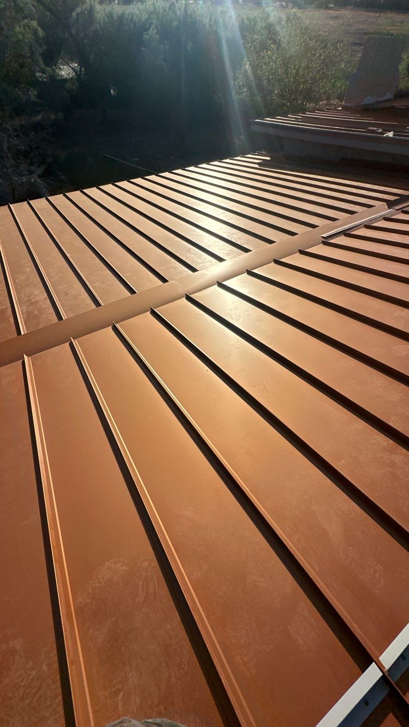 Bronze Standing Seam by Reimagine Roofing