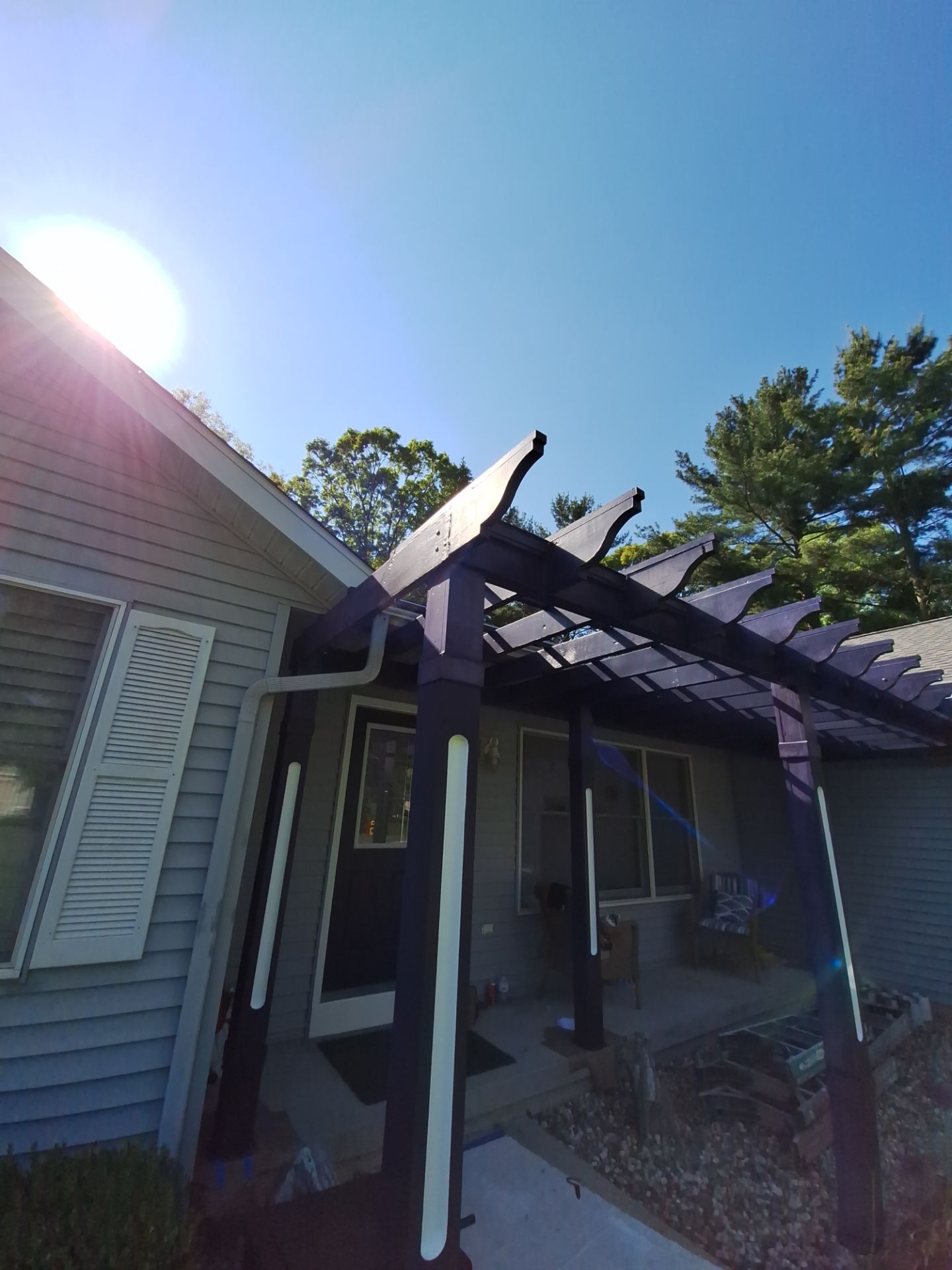 Repaint bedroom furniture, Pergola, and doors. Stain decking by Gordon Painting