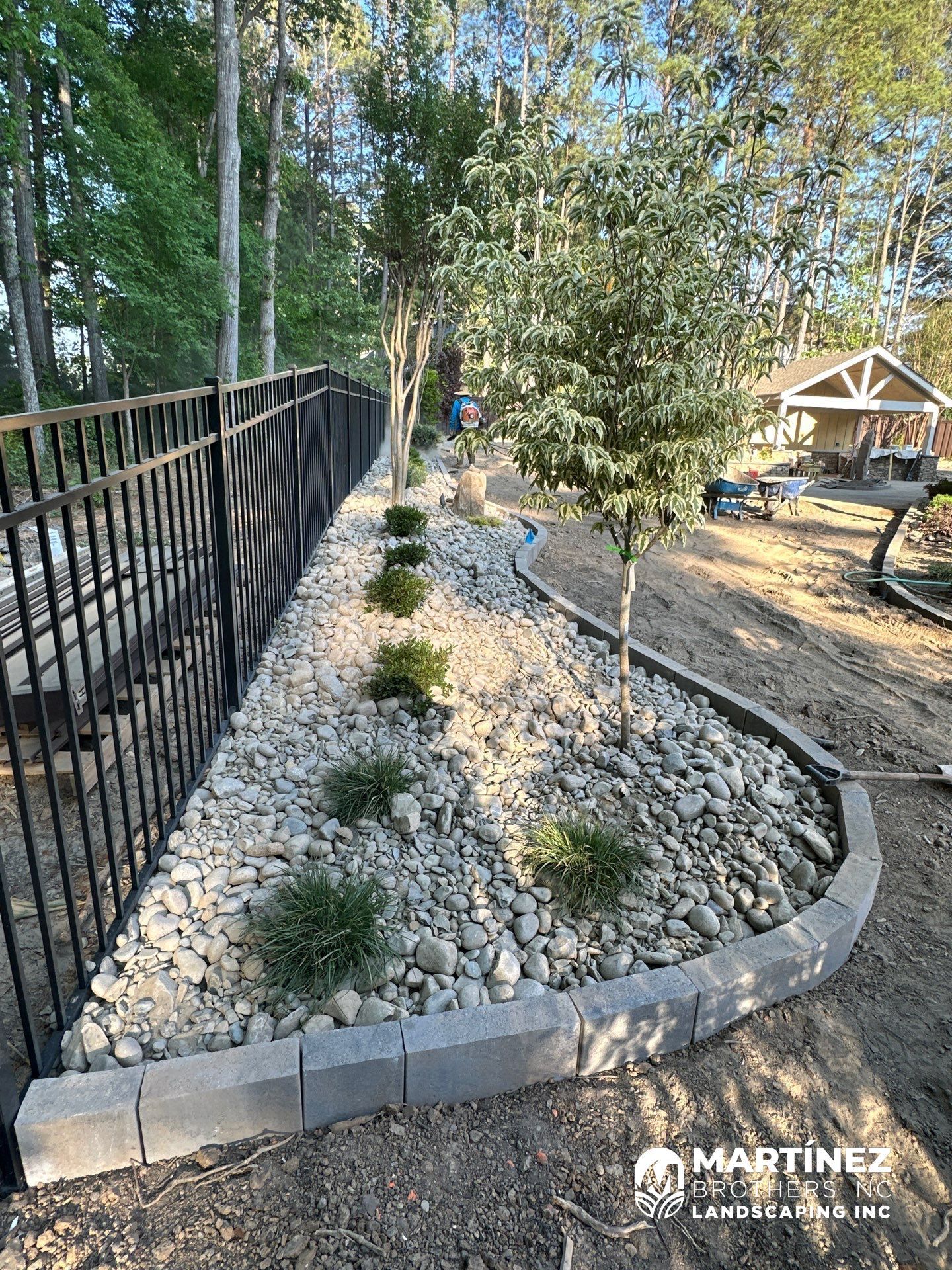 Backyard oasis in Cary by Martinez Brother’s Nc Landscaping Inc