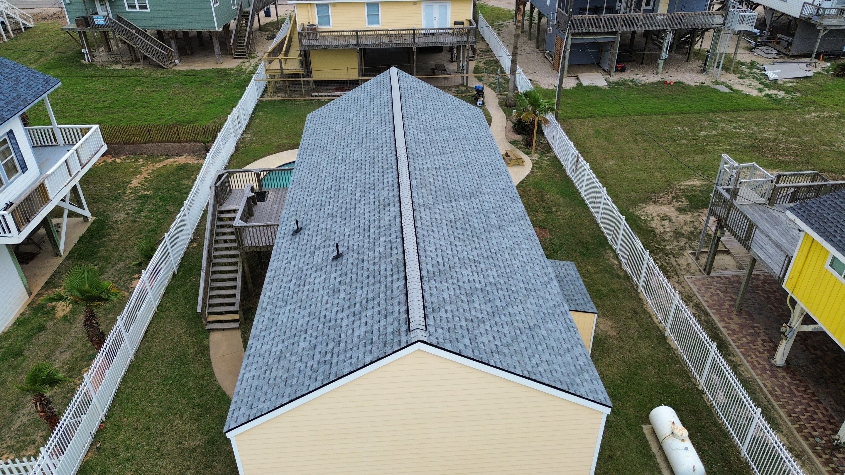Roof Replacement using IKO Cambridge Dual Grey by CAP Roofing and Construction LLC