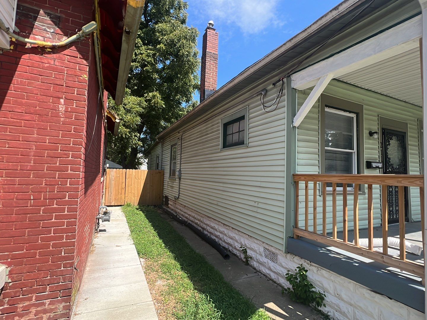 Rental Property Restoration, siding, flooring, gutters, landscaping by Storm Contracting 