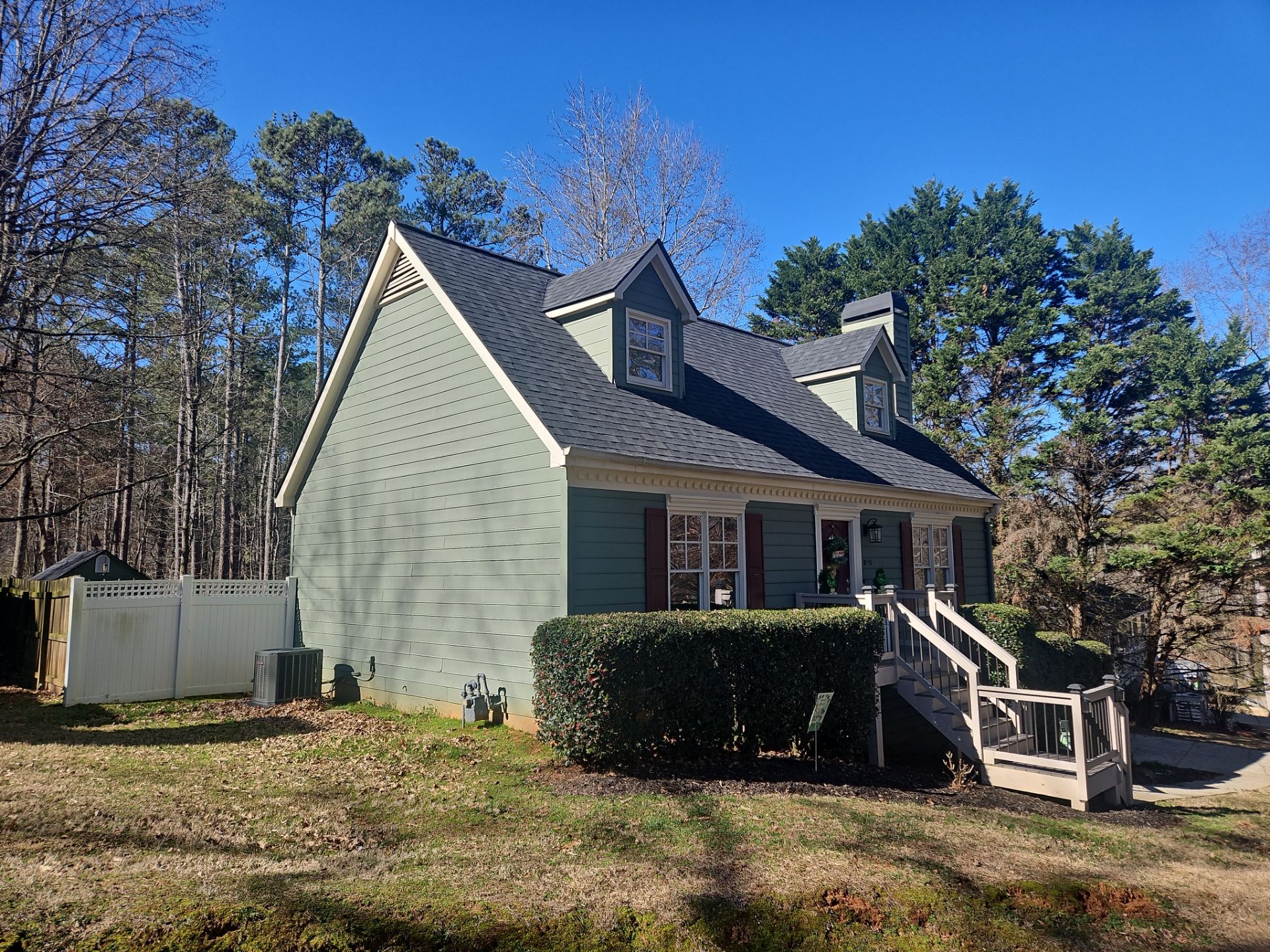 James Hardie Siding Install, Rotten Wood and Gutter Replacement and Exterior Painting by Nelson Exteriors 
