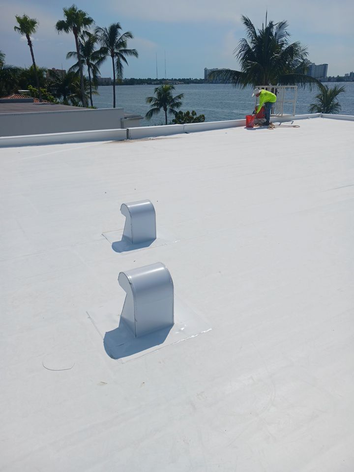 Flat Roof White Membrane and Insulation Installation in Miami Beach by AJF ROOFING INC