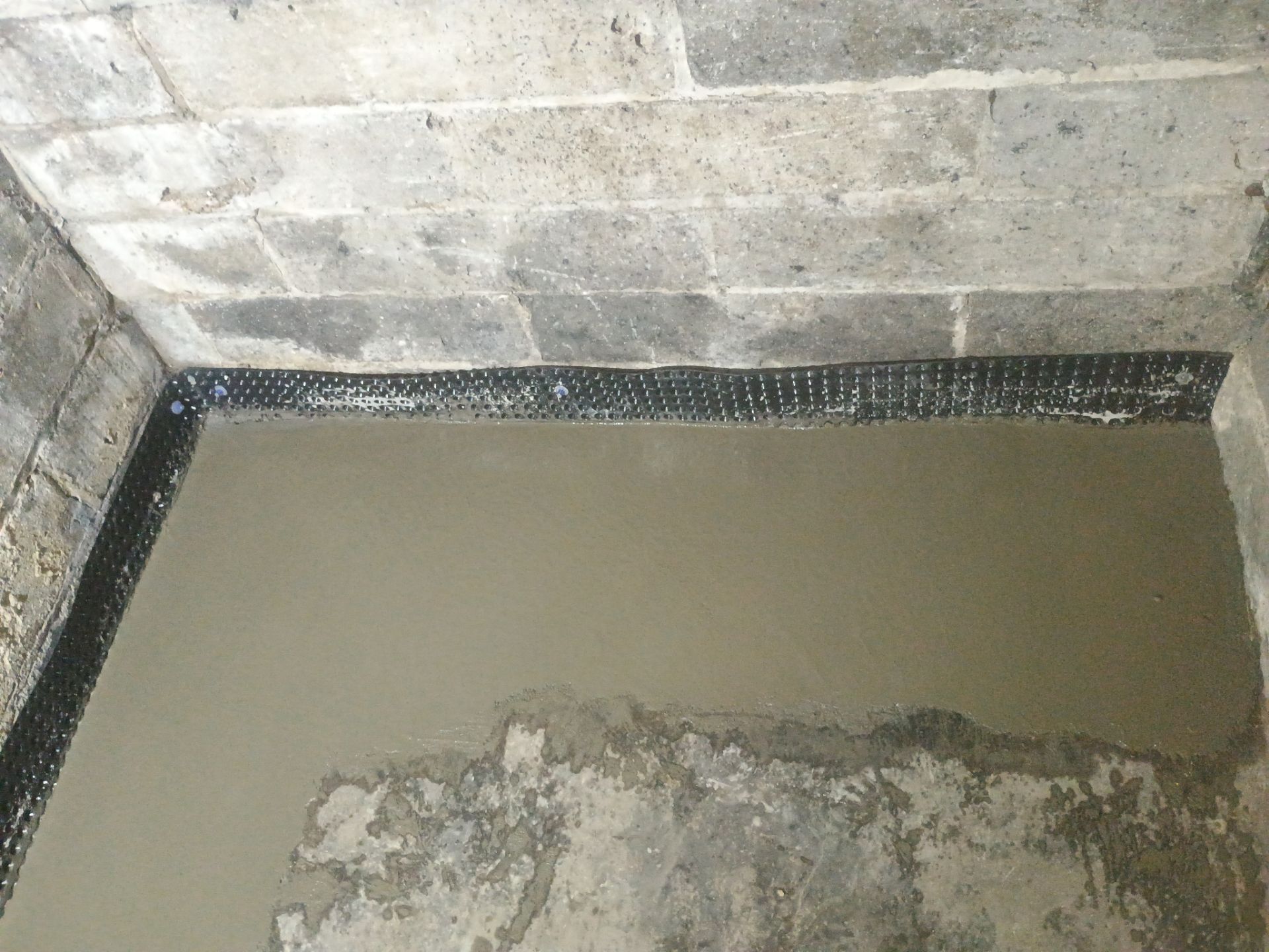 Interior Drain Tile for a South Minneapolis Basement by Waterproofing Northeast