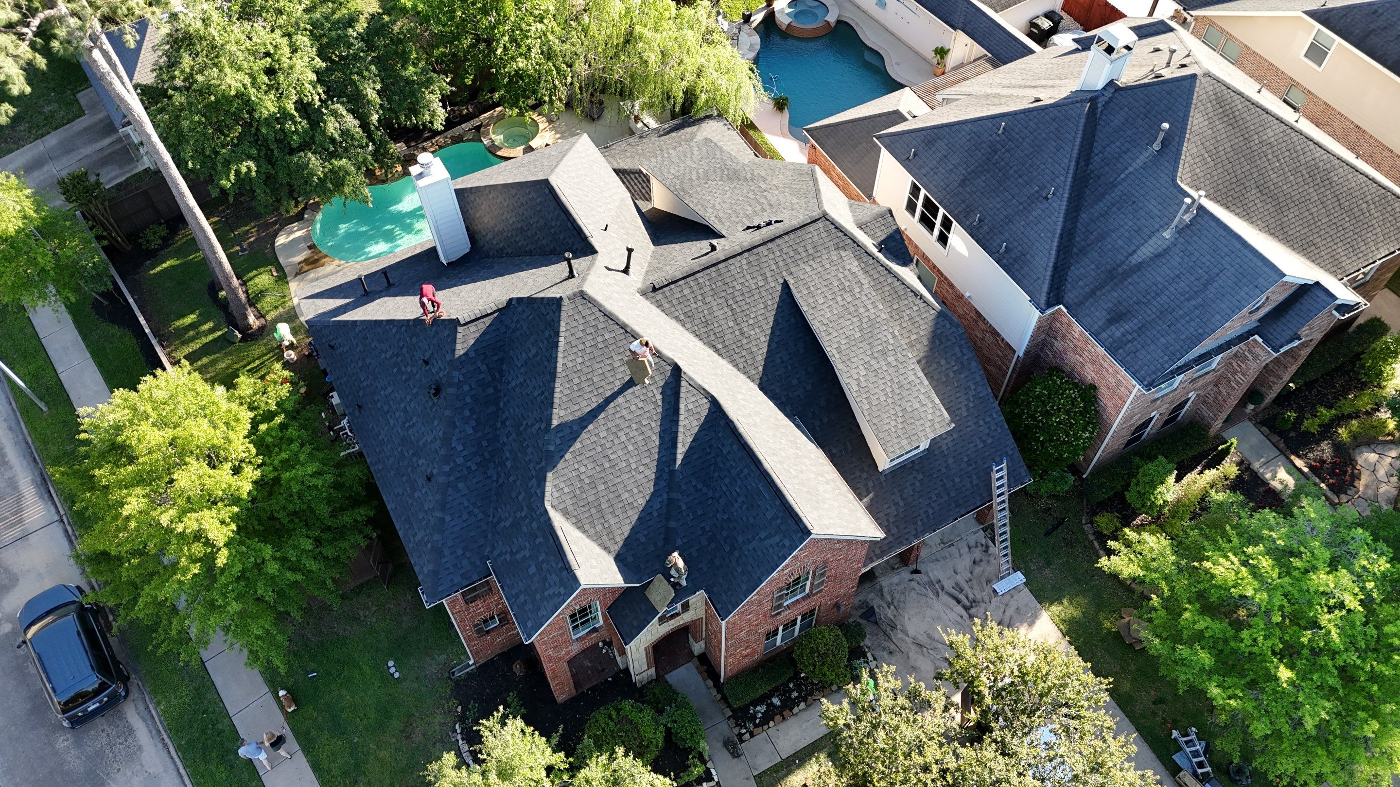 Residential Roofing Installation using Architectural Shingles by Core Four Roofing