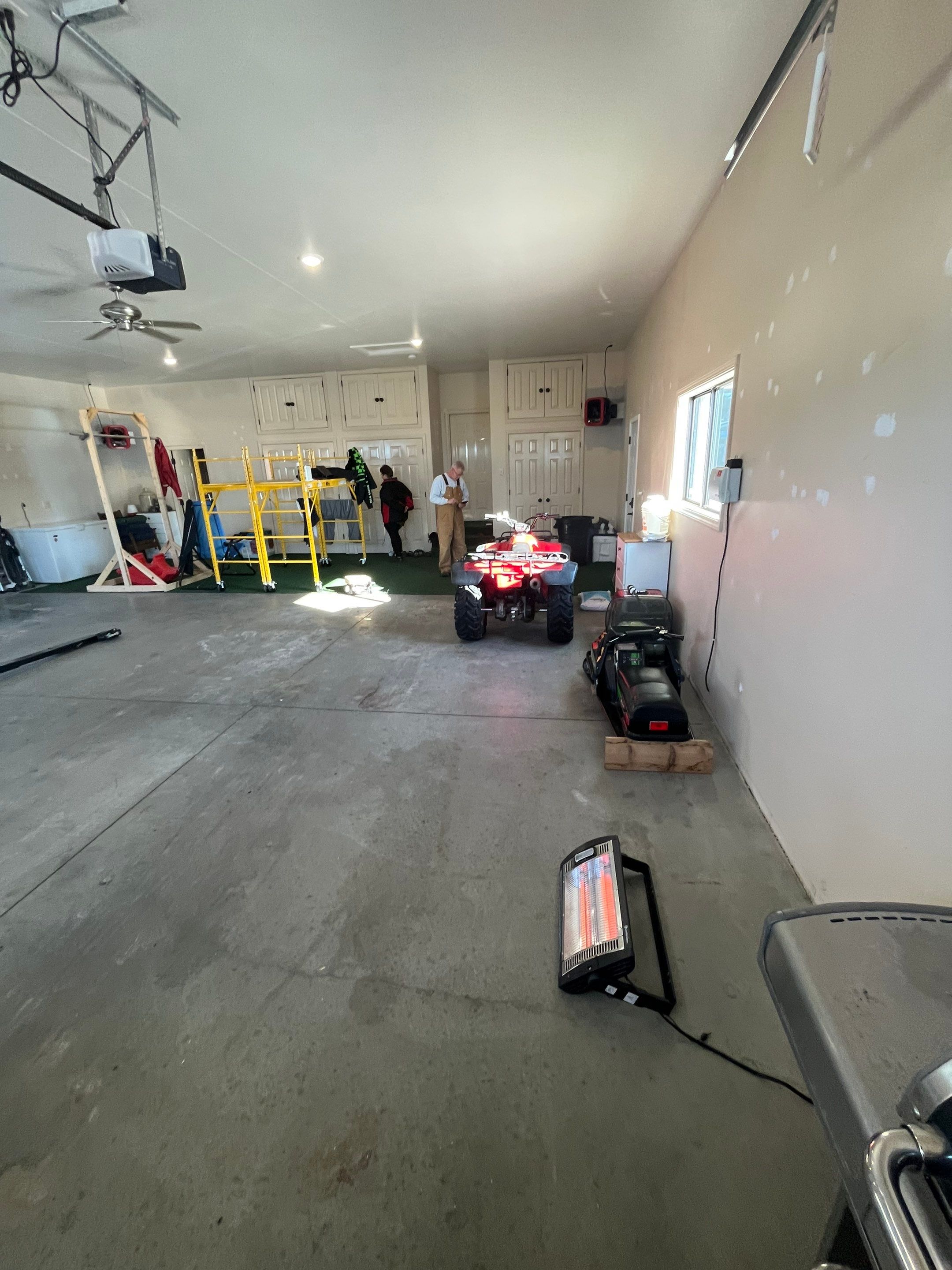 Garage using Mediterranean by Select Painting, Coatings & Garage Cabinets