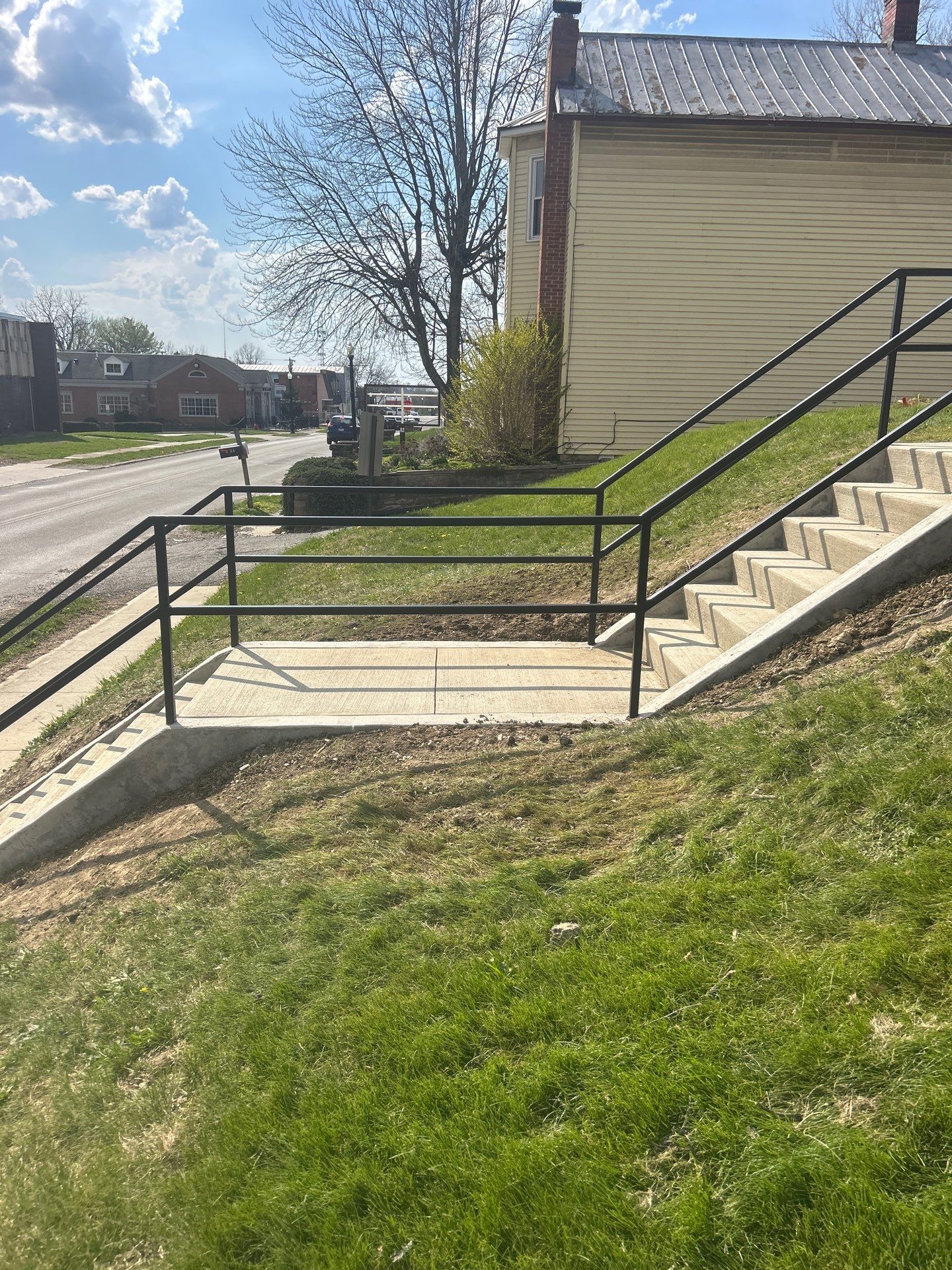 Concrete Staircase and Metal Handrail Installation in Sunbury by Concrete One Construction
