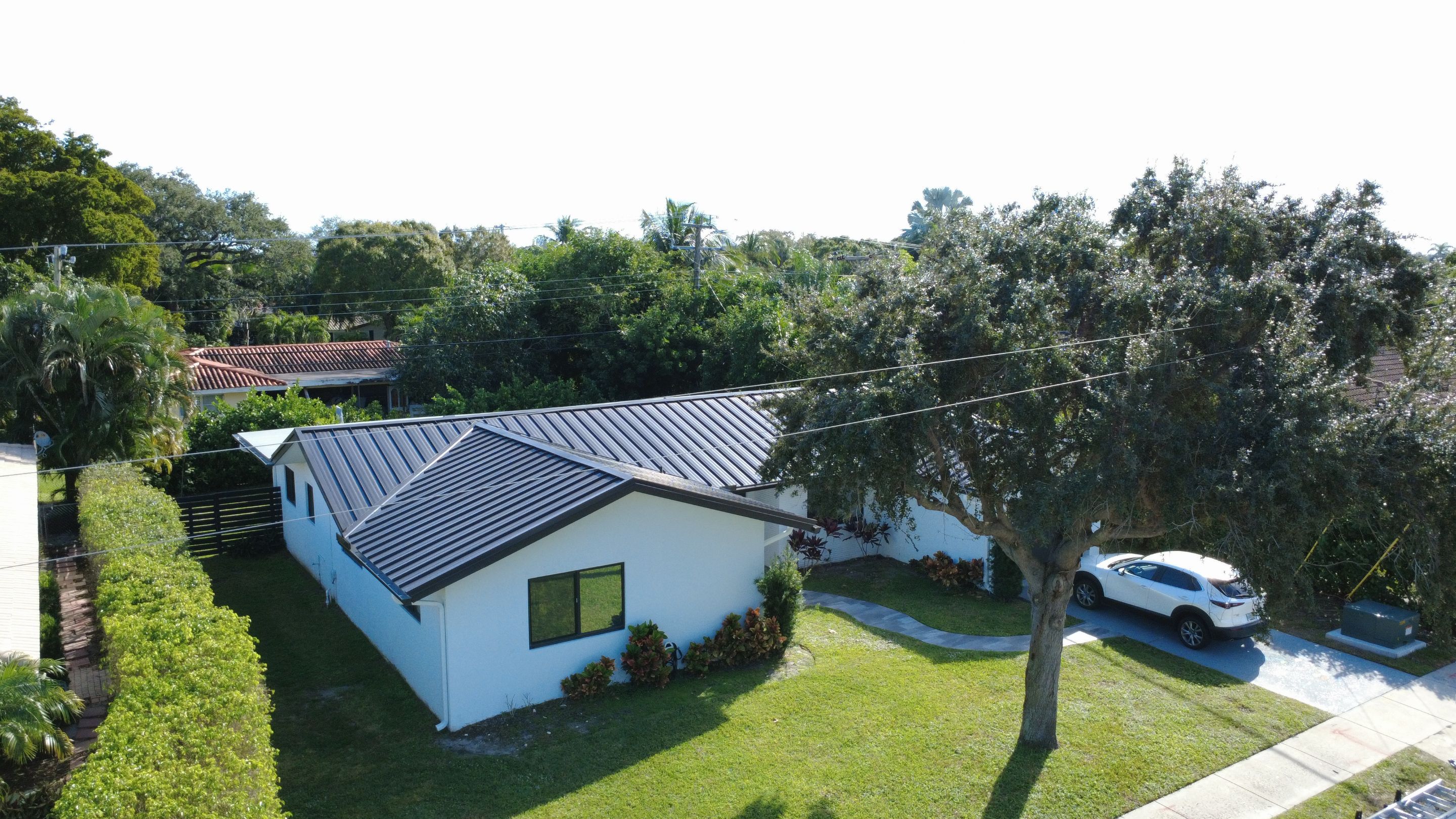 Residential Roofing Installation using 1" Nail strip metal roof by BLUES BROTHERS ROOFING