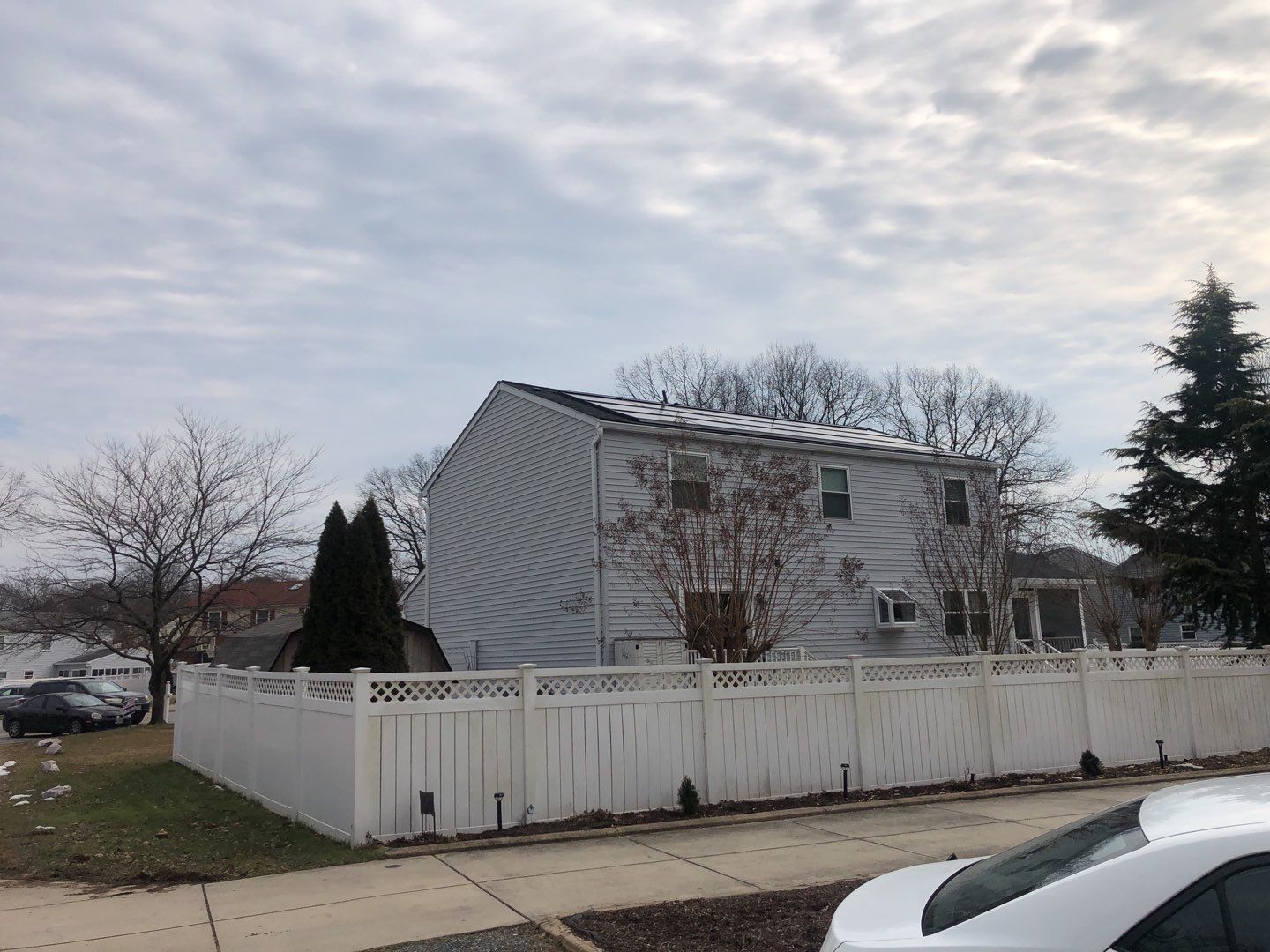Roof Replacement with GAF Decotech integrated solar panels by American Home Contractors
