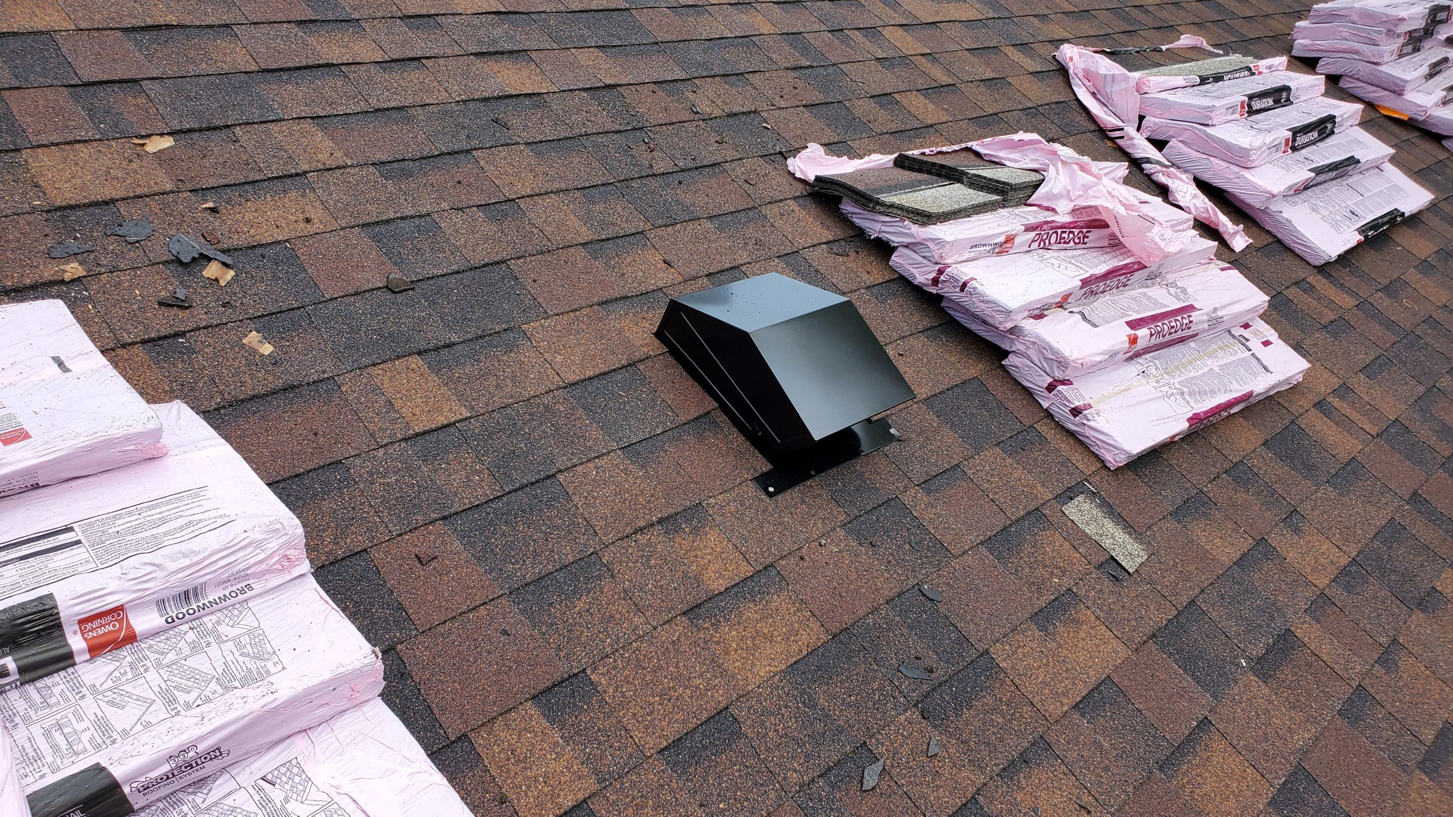 Residential Roofing Installation using Ownens Corning Duration Brownwood by Absolute Roofing and Construction