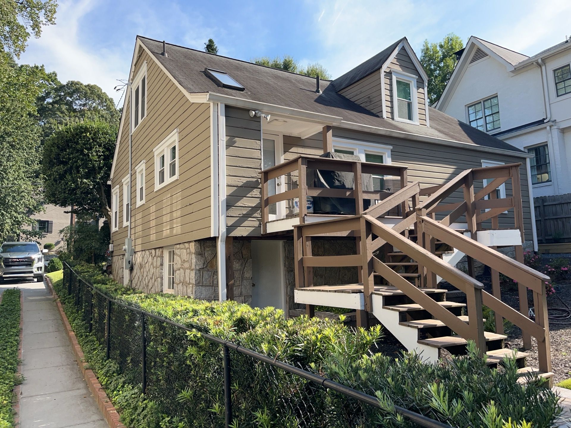 Full Siding Replacement, Deck Build, Exterior Paint, and Gutter Replacement  by Nelson Exteriors 