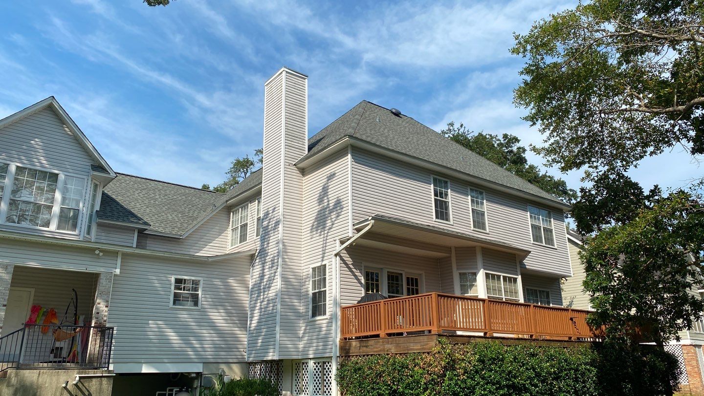 Residential Roofing Installation using Roof Replacement by American Roofing & Construction LLC