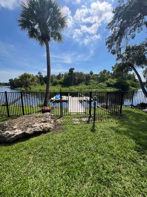 Aluminum Fence Installation using Black 3 Rail Aluminum Fence