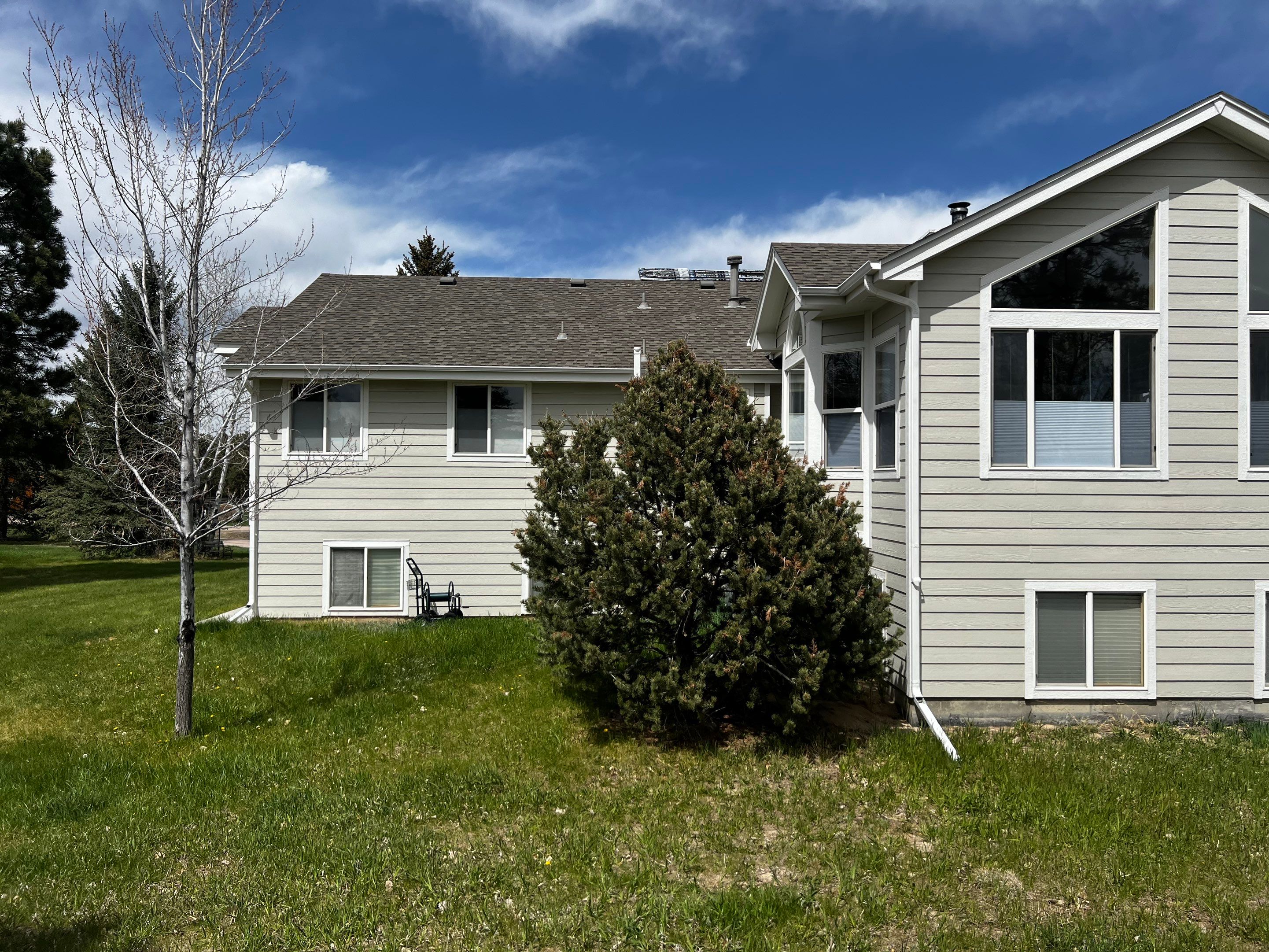 Residential Roofing Installation using Atlas Pinnacle Impact Weathered Wood by Blue Peaks Roofing LLC 
