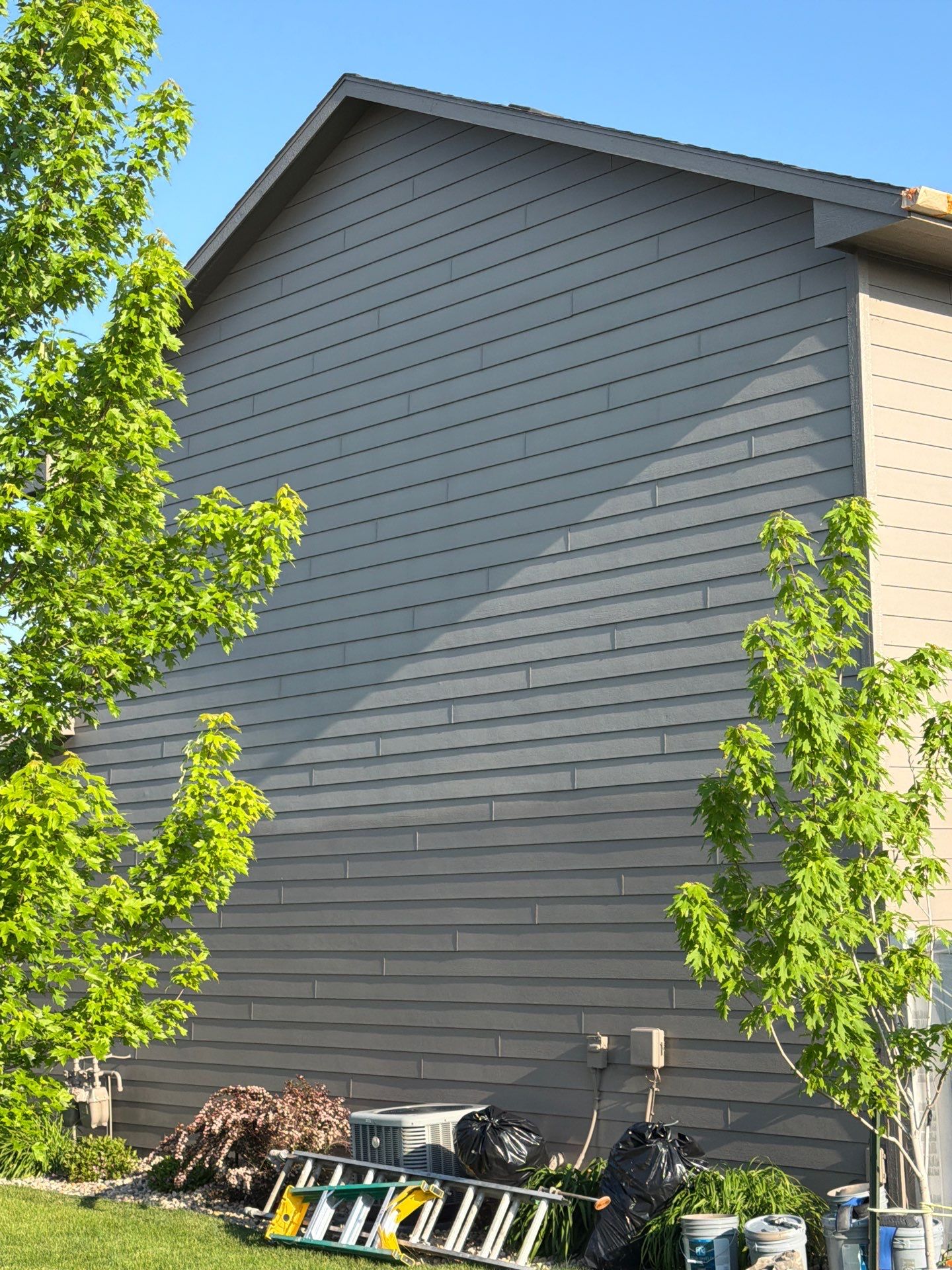 Multi-Family Exterior Painting and Trim Refresh in Sioux Falls by Select Painting, Coatings & Garage Cabinets