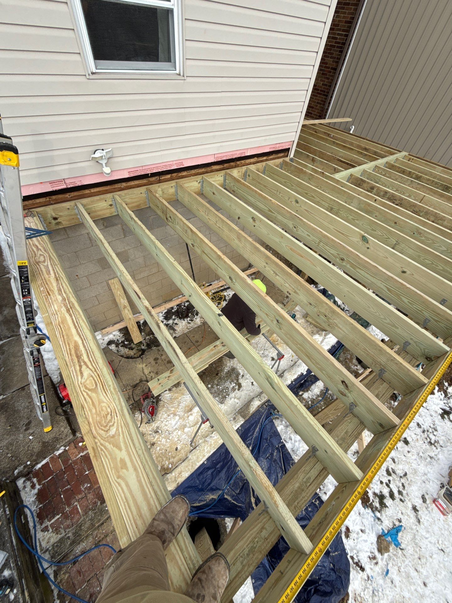 Deck and door by Cousins Roofing Siding & Decks