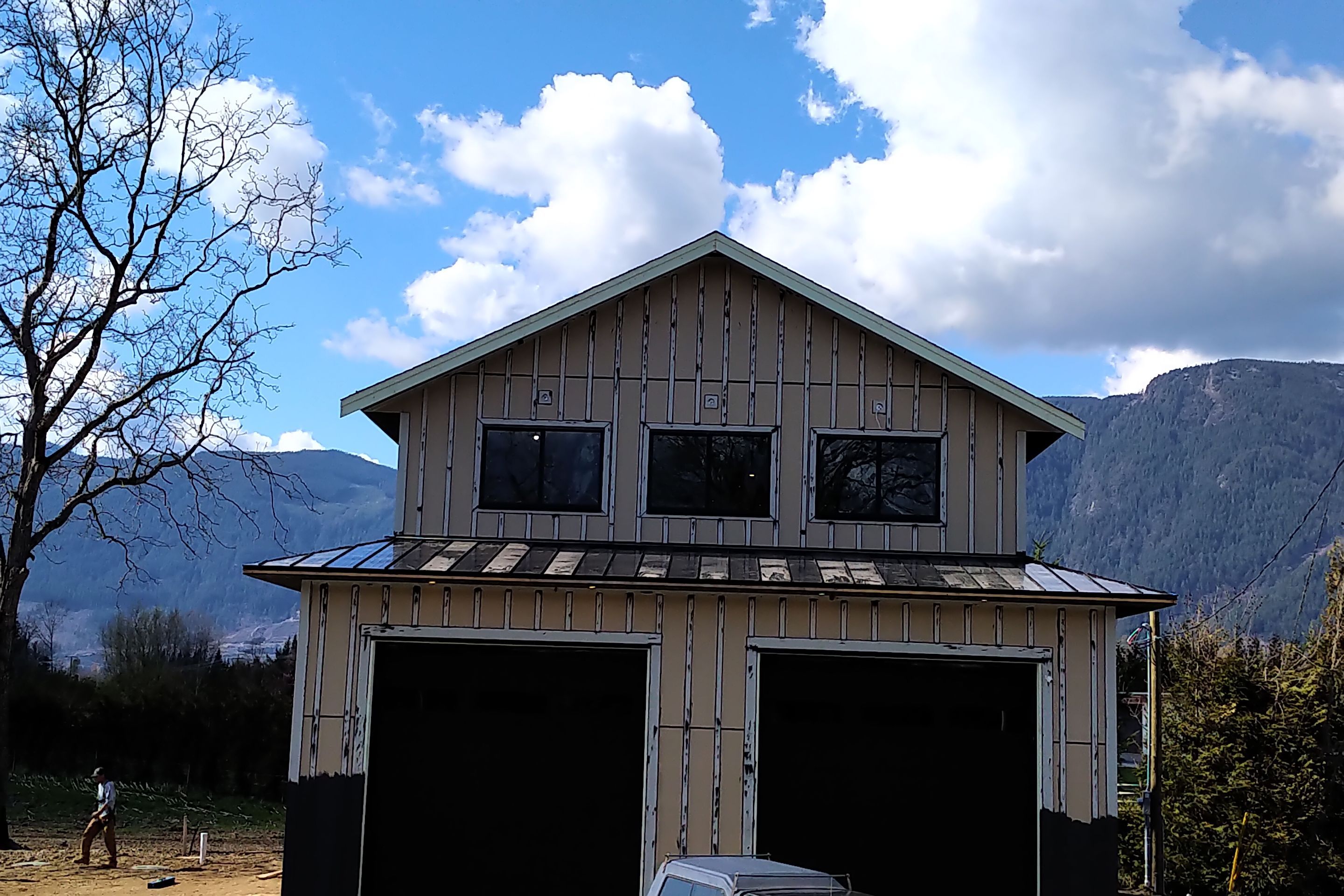 Residential Roofing Installation using 16" Prolok metal and Owens corning shingles by Top Notch Roofing Inc
