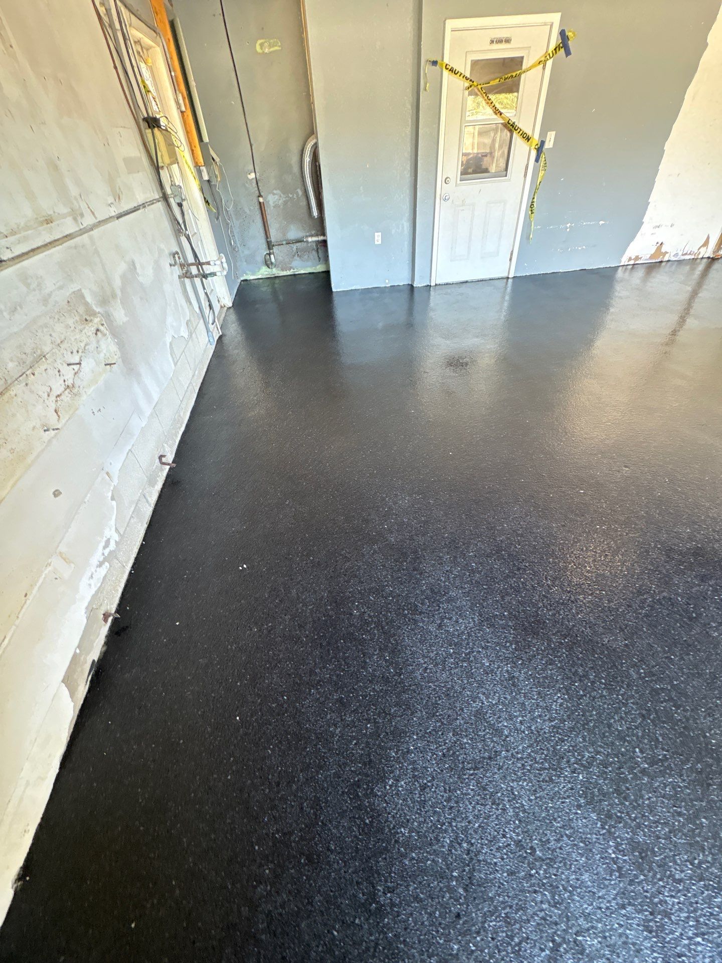 Clearwater Garage Floor Transformation with Carbon Flake Coating by Performance Floors & Coating