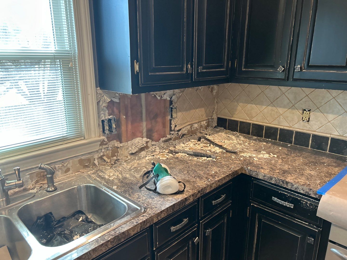 Subway tile backsplash  by Footprints Floors of Nashville