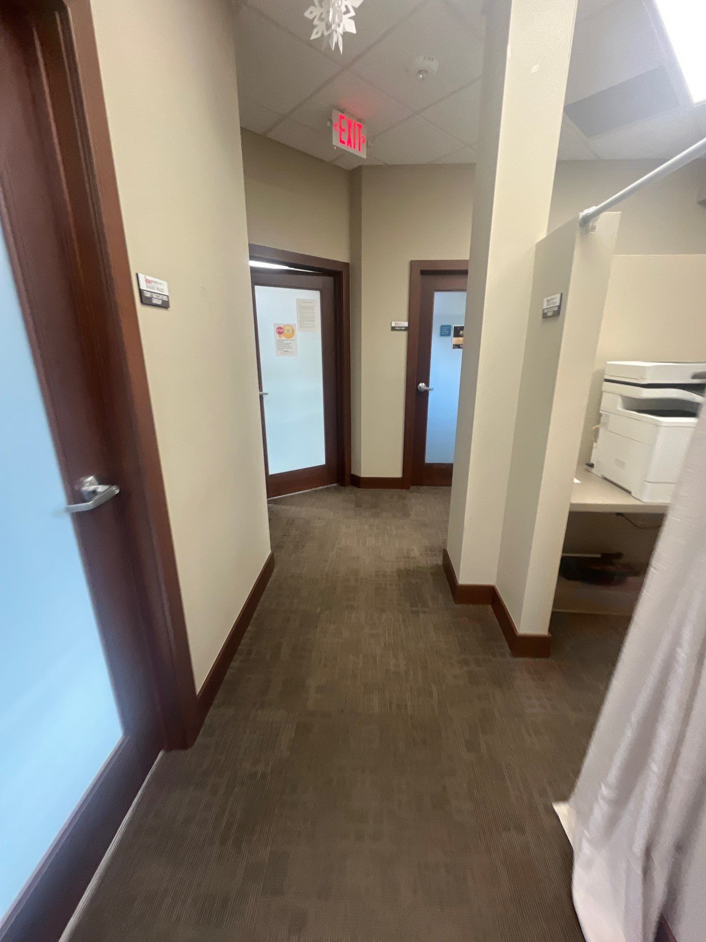 Commercial Office Interior Remodel and Modern Suite Refresh in Sioux Falls by Select Painting, Coatings & Garage Cabinets