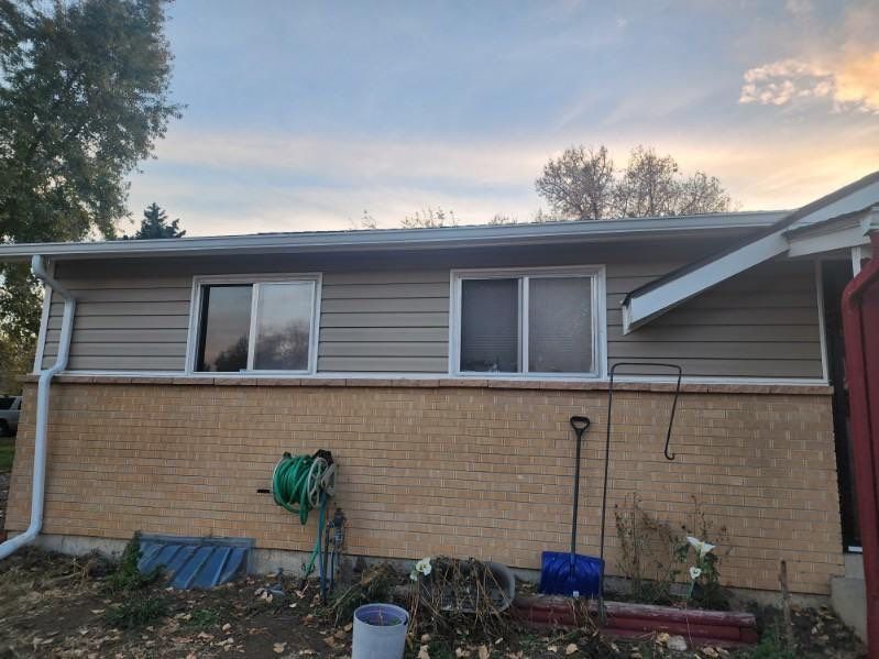Vinyl siding installation  by United Windows and Siding LLC