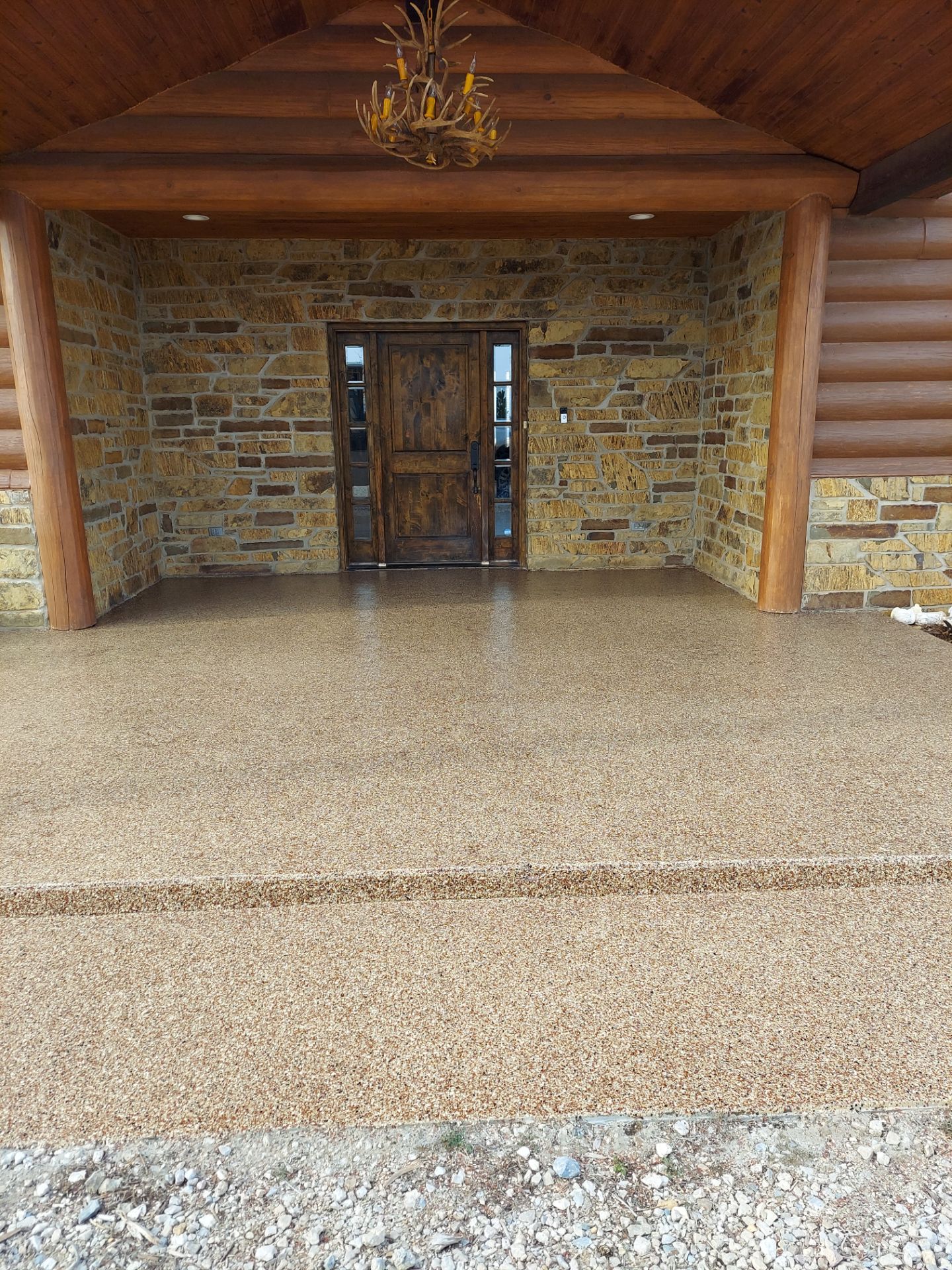 Patio Coating Installation with Chestnut by Copperhead Coatings