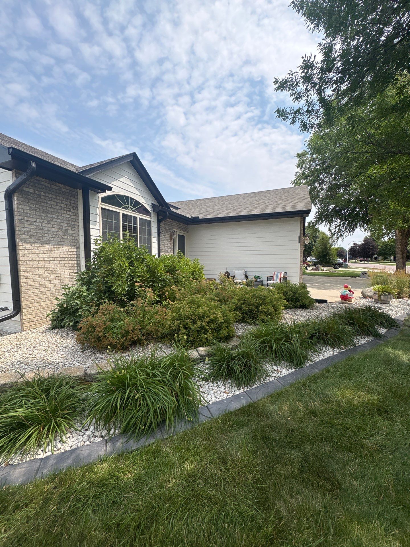 Residential Exterior Painting and Siding Refresh in Sioux Falls by Select Painting, Coatings & Garage Cabinets