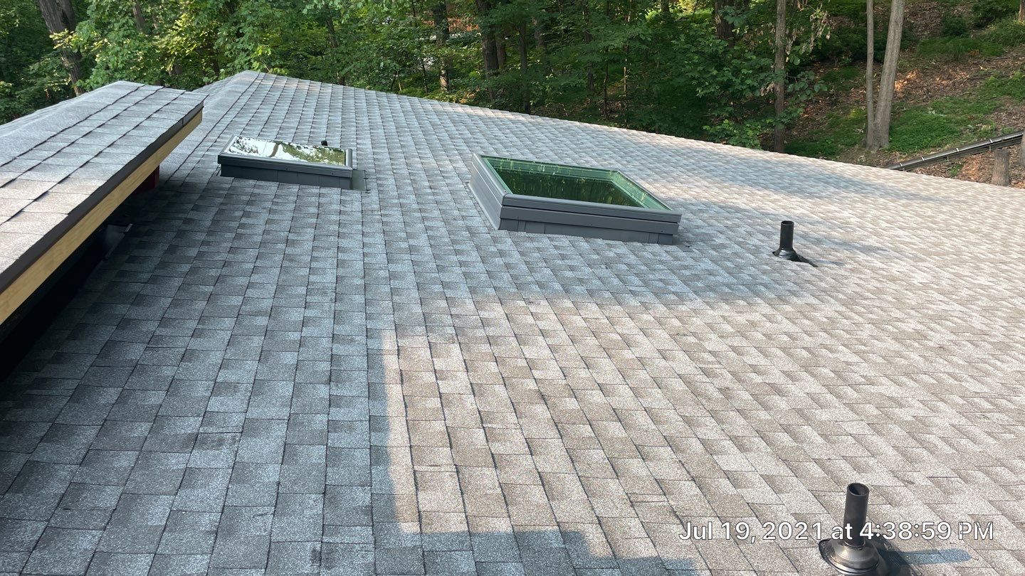 Deckhouse Roof Replacement by American Home Contractors