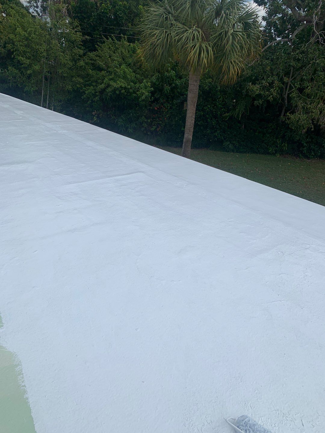 100% Silicone Roof Coating Repair using Tropical #924 Silicone Roof Coating by Morton Roofing, Inc.