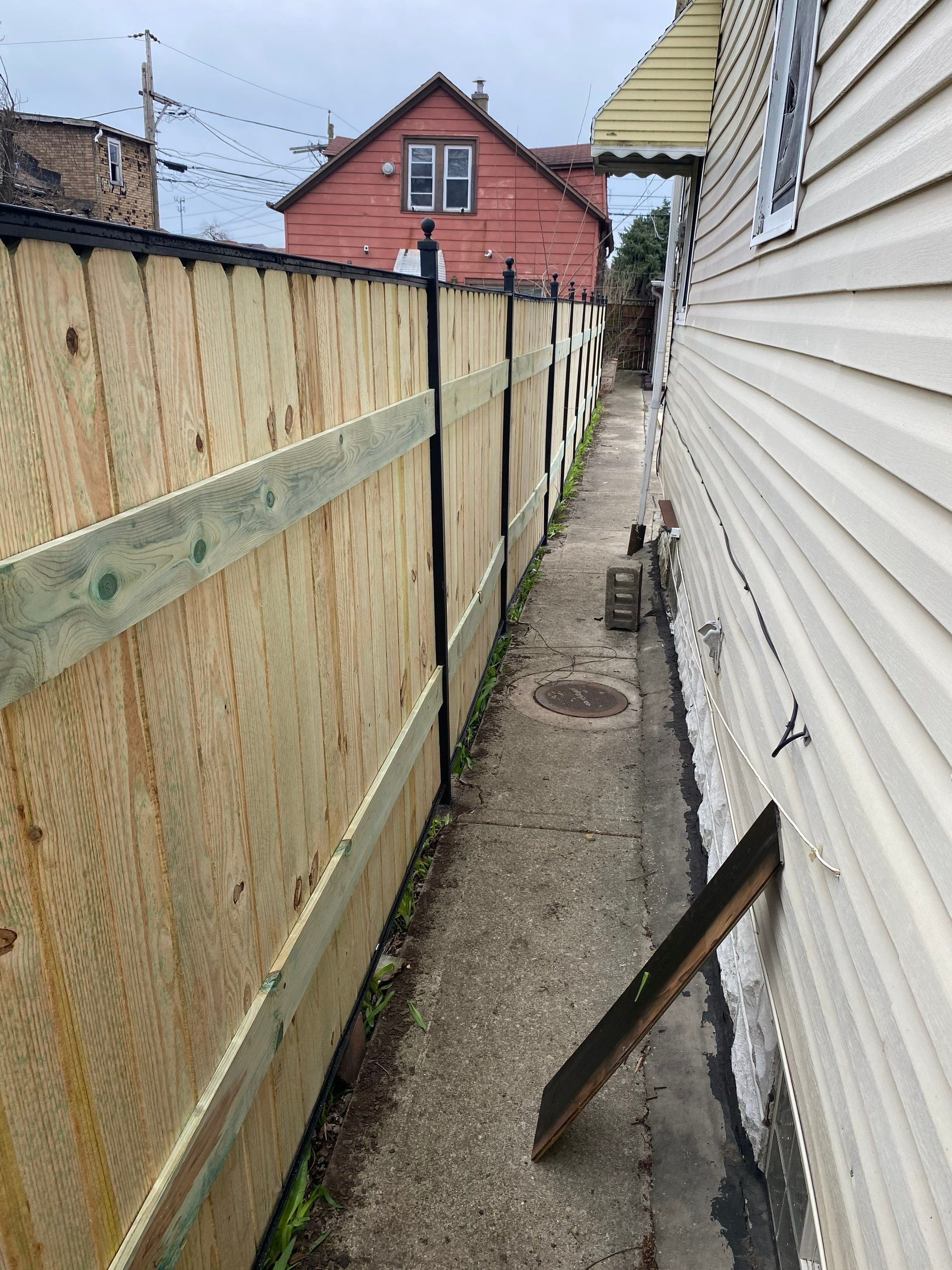 Fence Installation using pressure treated lumber  by INQUSE GENERAL CONTRACTOR