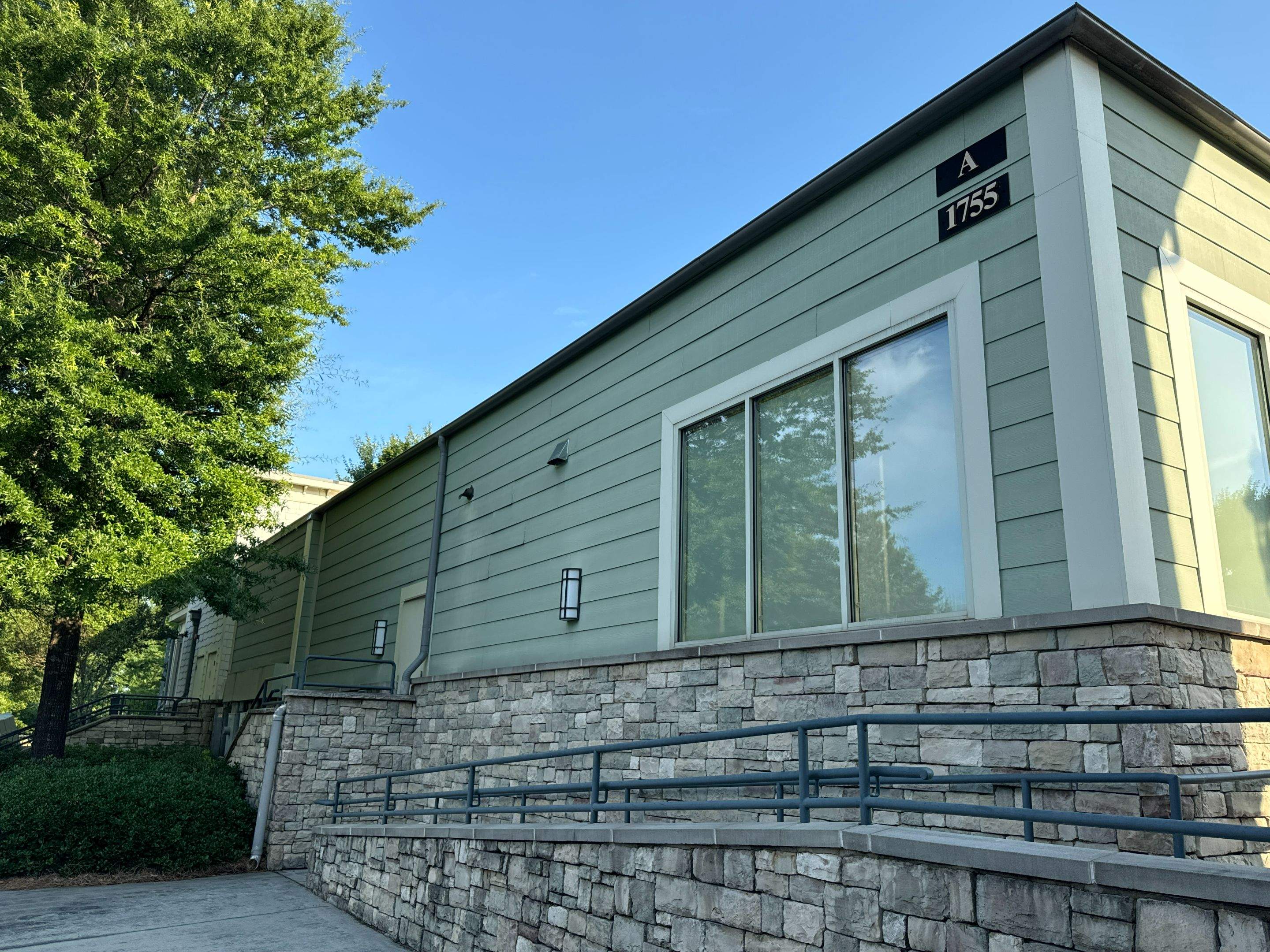 Commercial Exterior & Stairwell Painting – Corner Market by PGP Surface Solutions, LLC