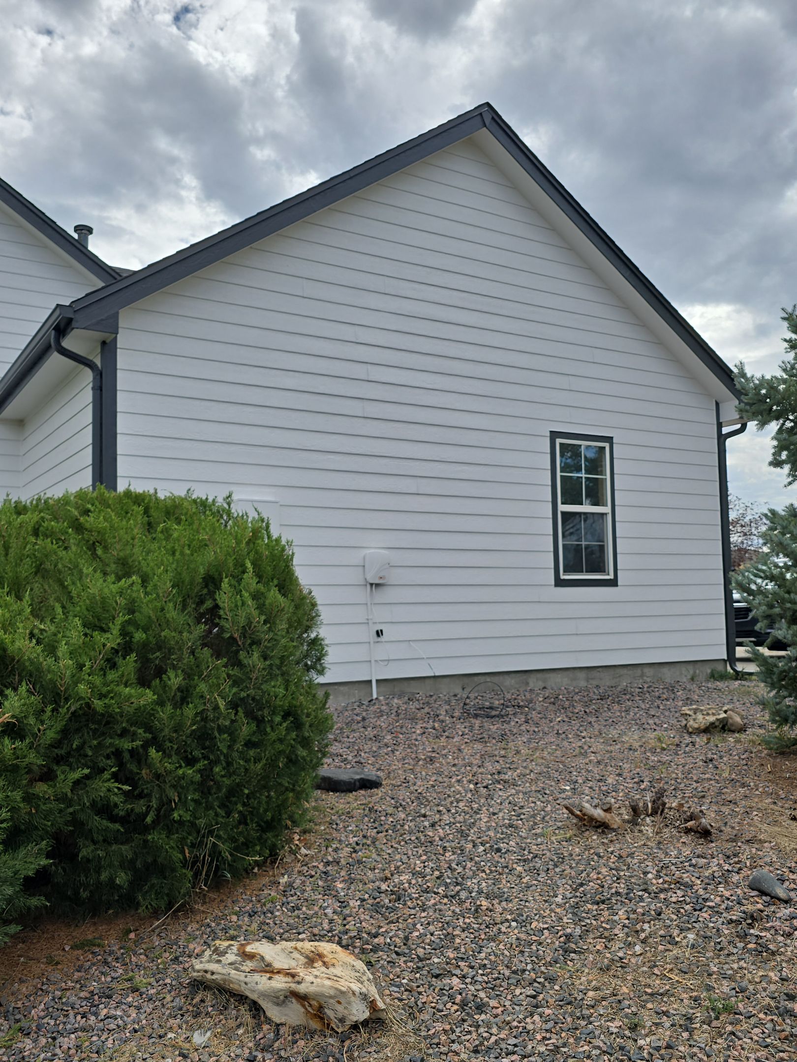 From Faded to Timeless: White & Black Exterior Renewal by J&M Painting LLC