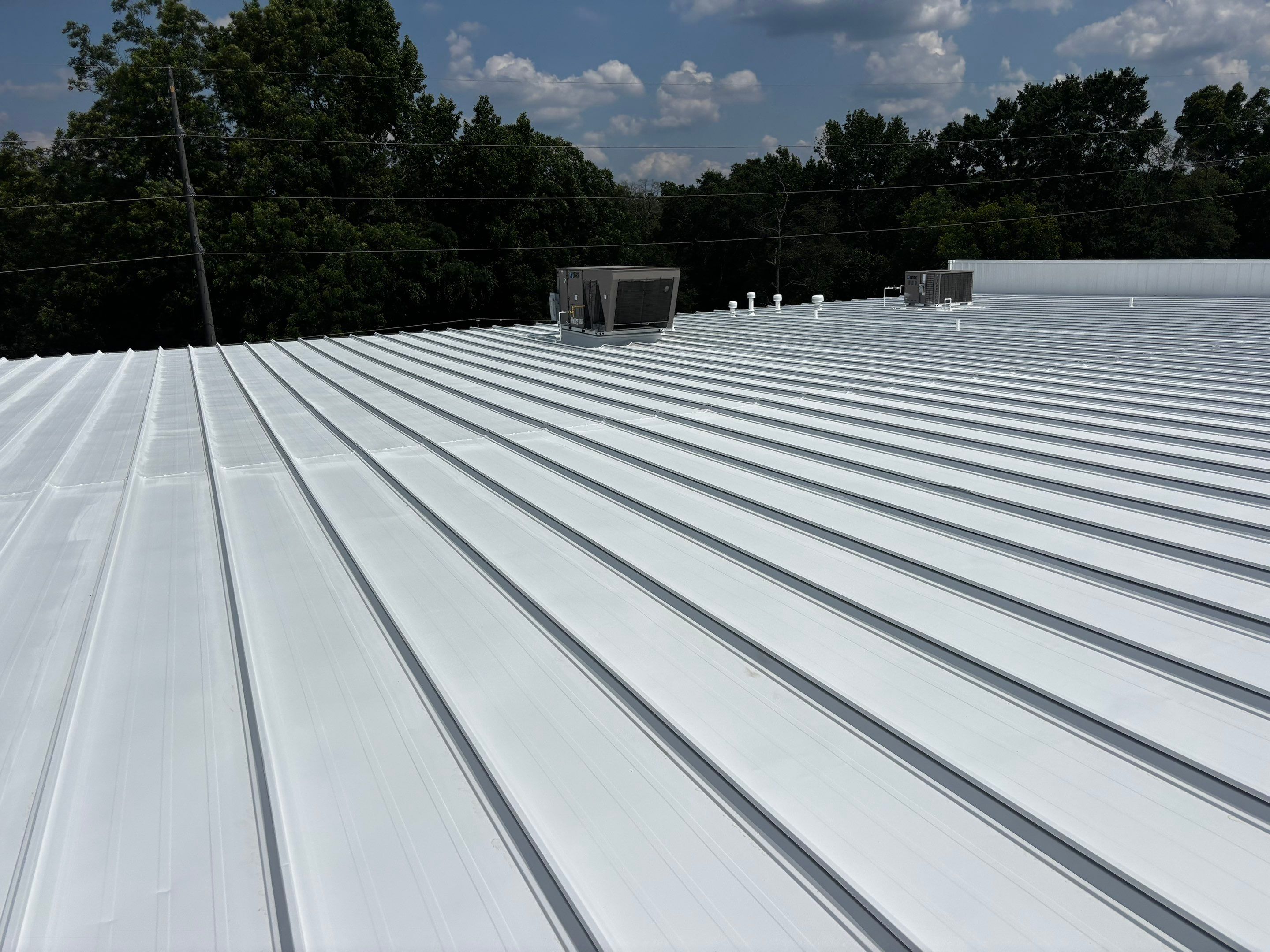 12,180 SQ Ft Commercial Metal Roof Restoration in Clarkston by Southern Roof Solutions