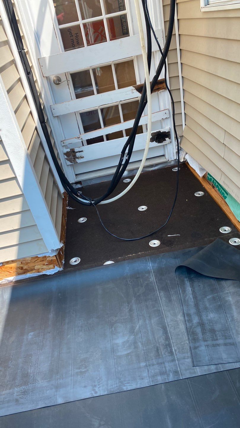 Siding Repair using Certainteed Mainsteet D4 and EPDM roof under deck by A Plus Exterior