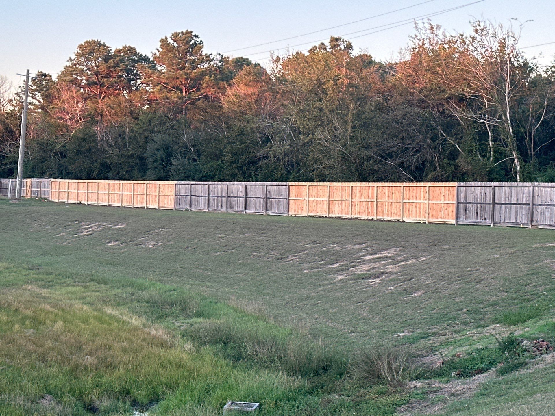Premium Commercial Fence Installation with Western Red Cedar Pickets, 3 Rails, and Deluxe Wood Gates" by Tim's Fences