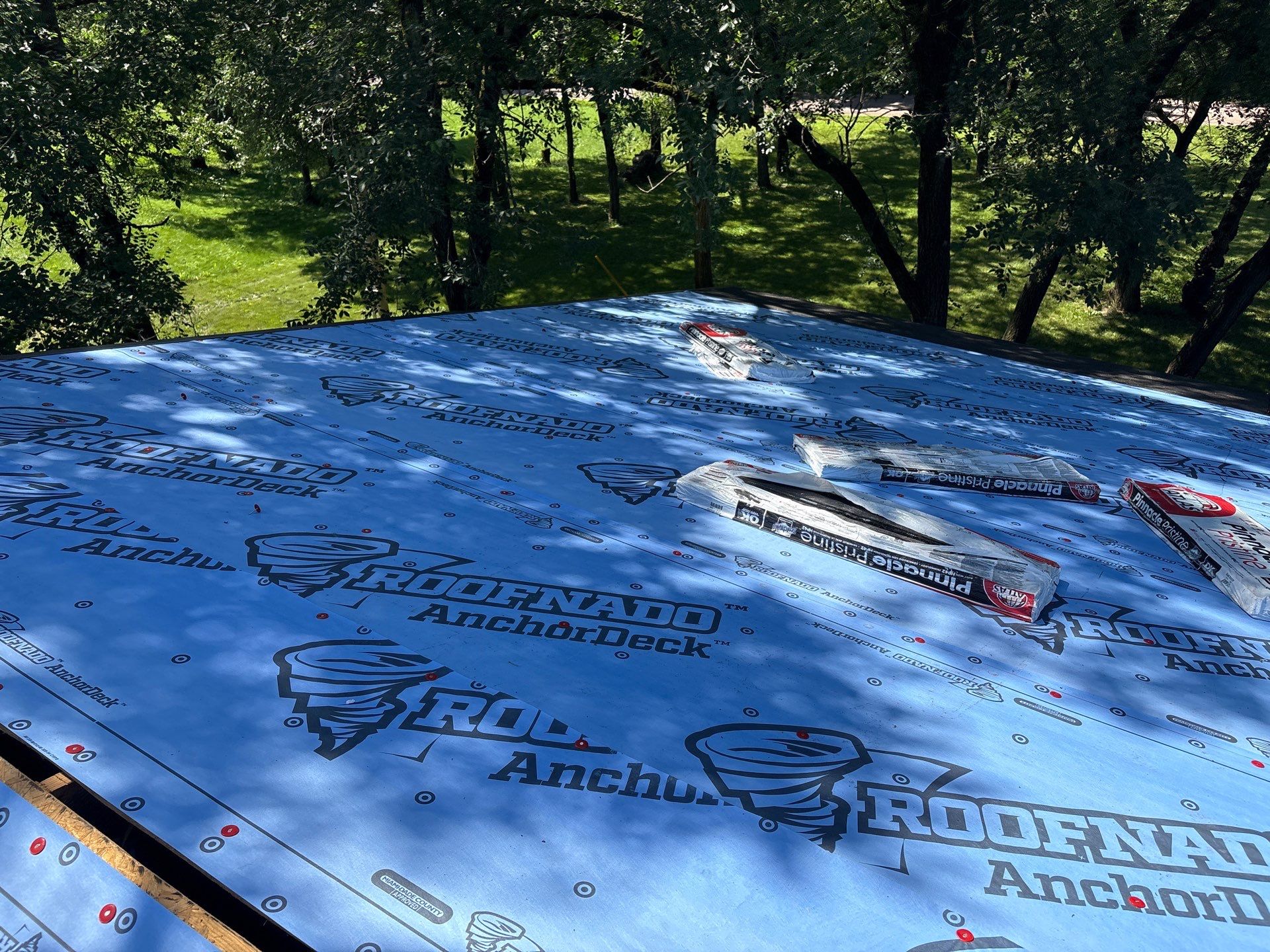 Residential Roof + Gutters & Downspouts Install  by Titan Commercial & Residential Roofing 